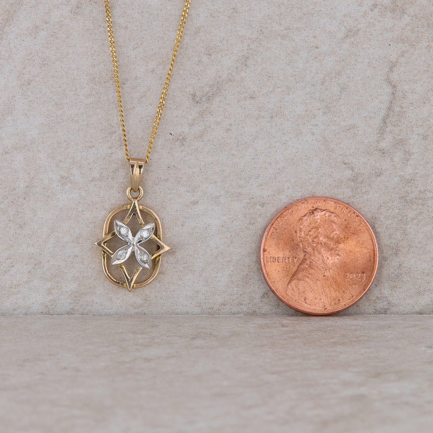 14k Two Tone Floral Star and Oval Style Pendant with 16" curb chain