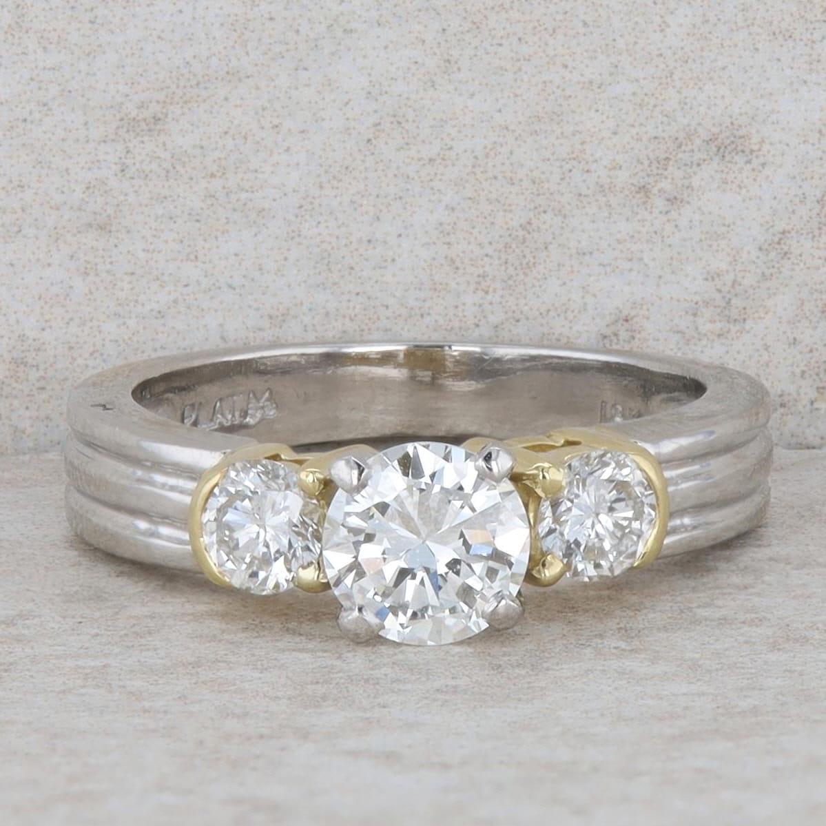 Platinum and 18k Yellow Gold Three Stone Diamond Ring