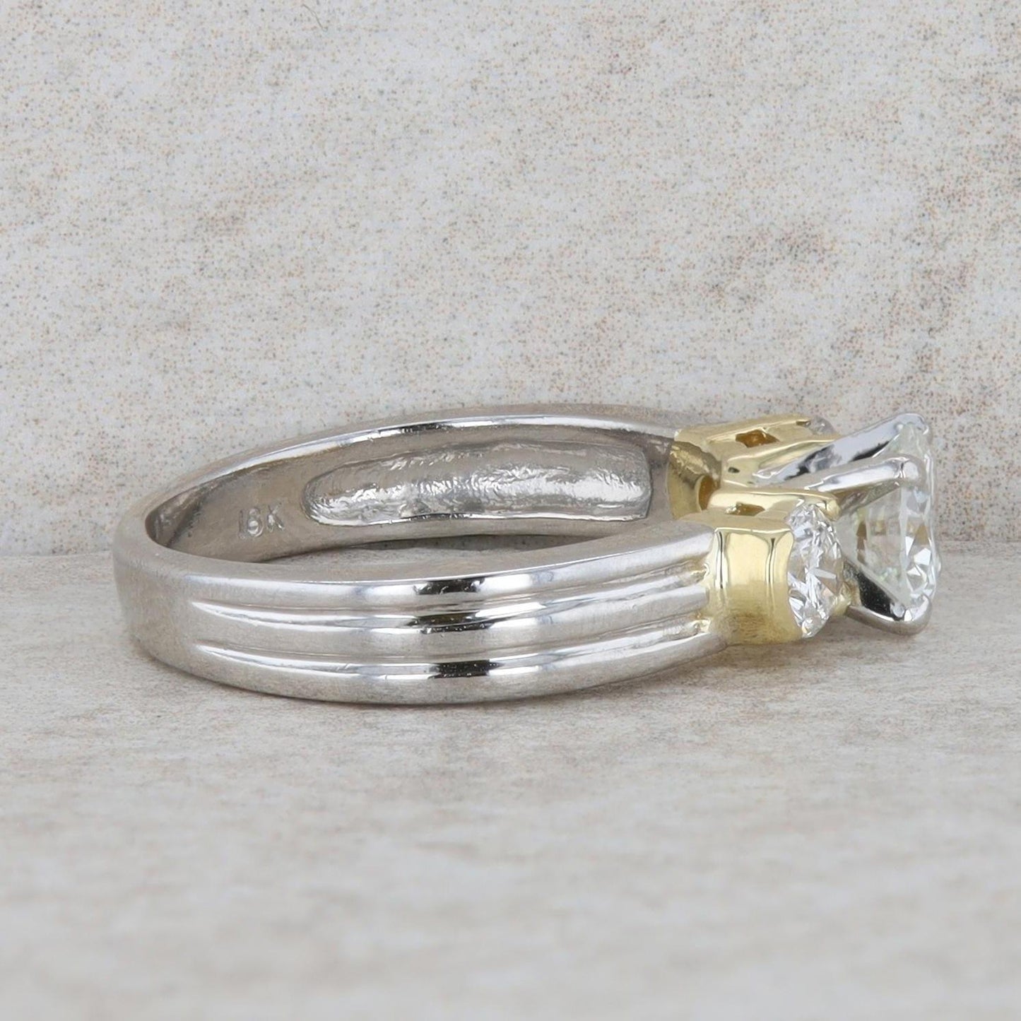 Platinum and 18k Yellow Gold Three Stone Diamond Ring