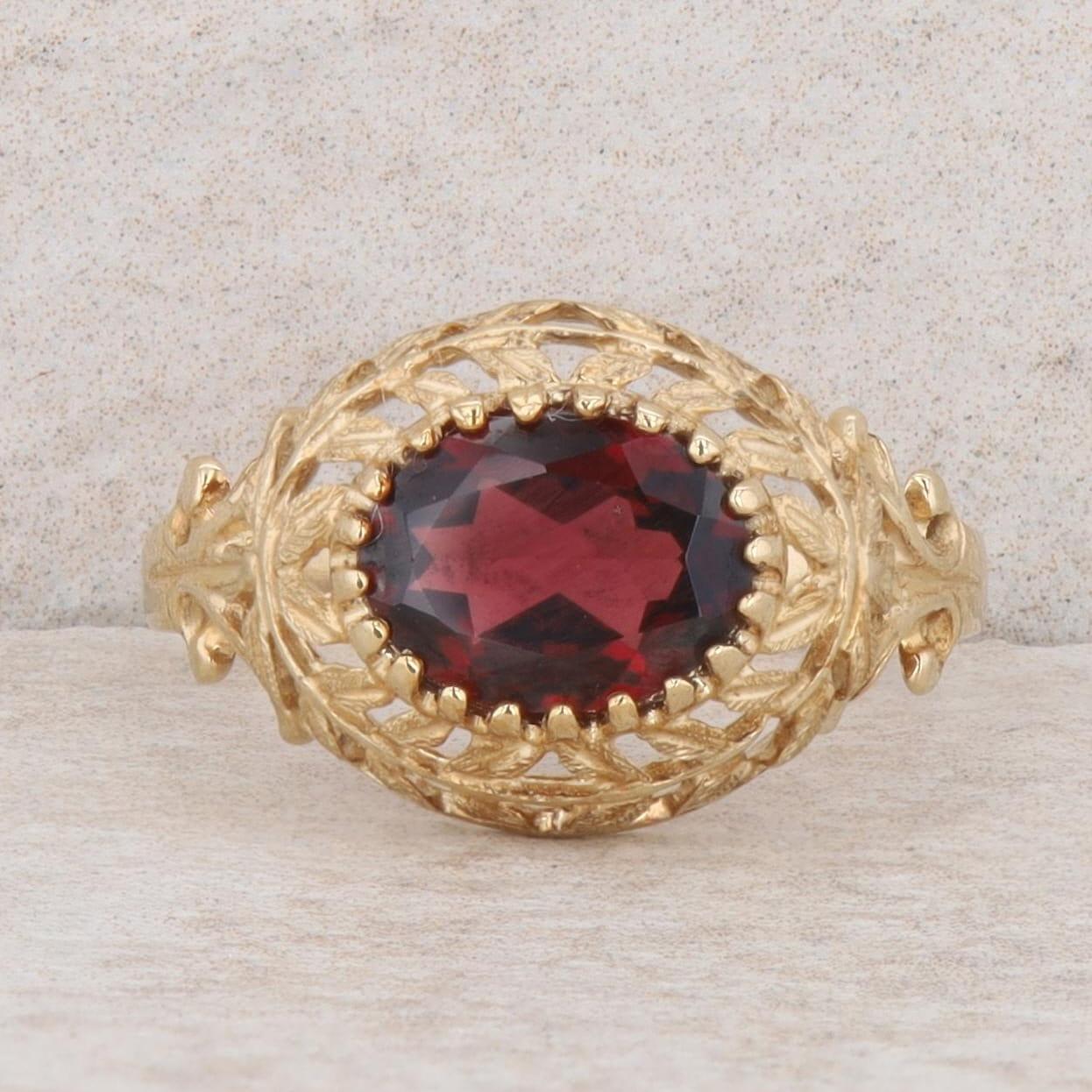 10k Yellow Gold Oval Garnet East/West Set Leaf Filigree Ring, Finger Size 7.25