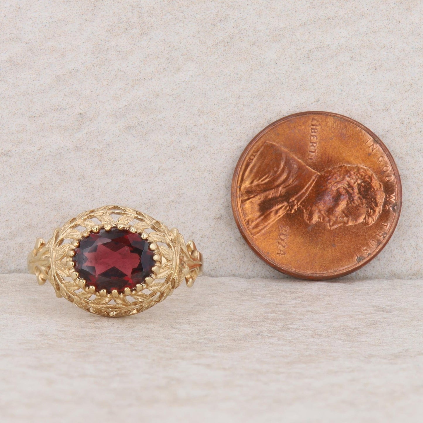 10k Yellow Gold Oval Garnet East/West Set Leaf Filigree Ring, Finger Size 7.25