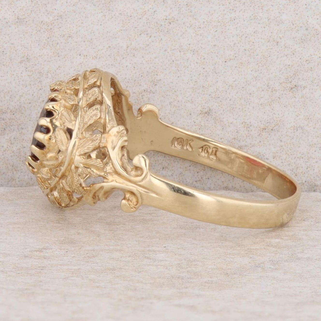 10k Yellow Gold Oval Garnet East/West Set Leaf Filigree Ring, Finger Size 7.25