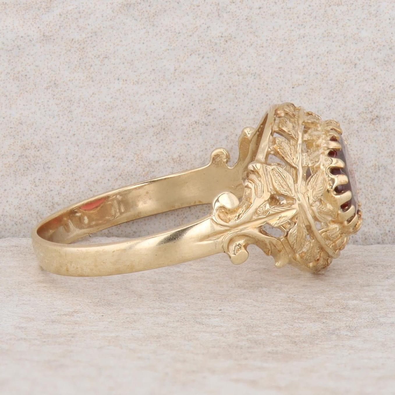 10k Yellow Gold Oval Garnet East/West Set Leaf Filigree Ring, Finger Size 7.25