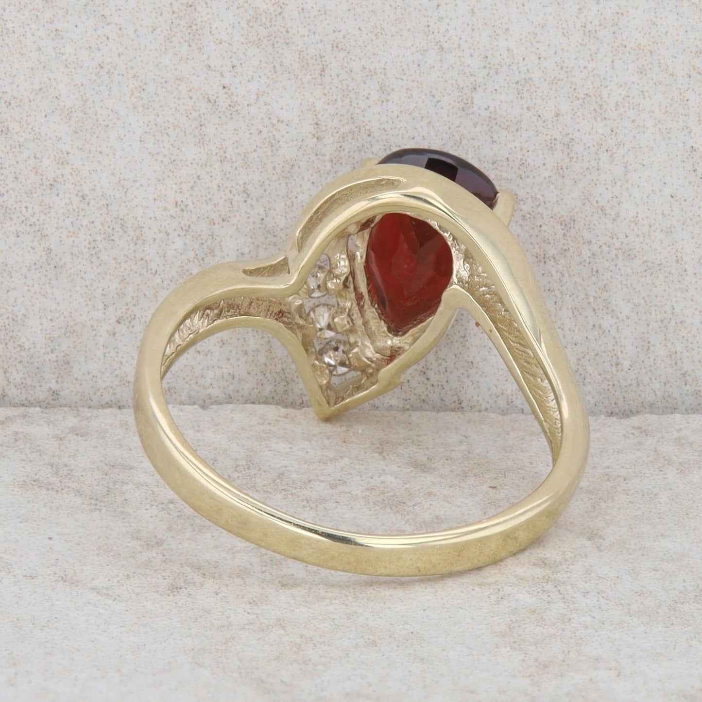 10k Yellow Gold Pear Mozambique Garnet & Diamond Curved Ring