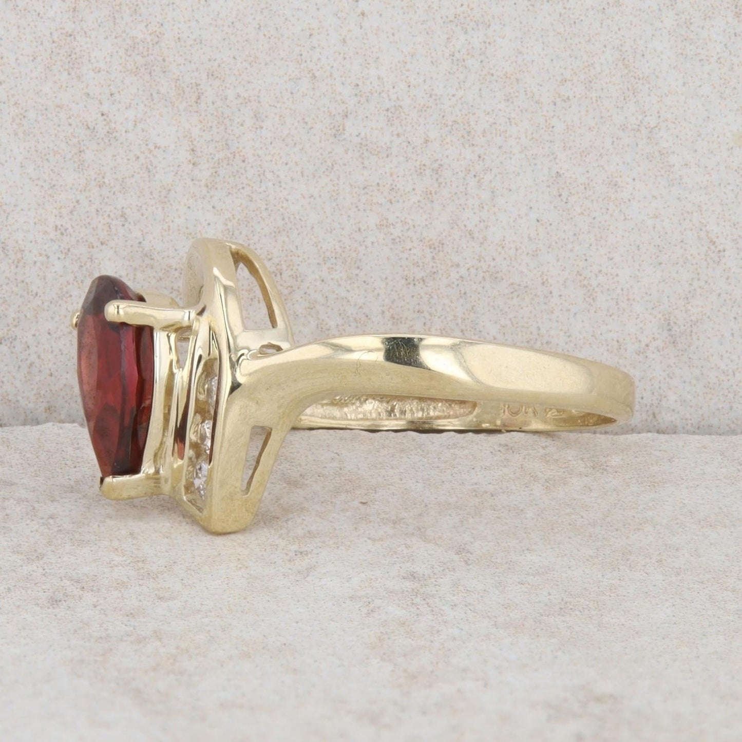 10k Yellow Gold Pear Mozambique Garnet & Diamond Curved Ring