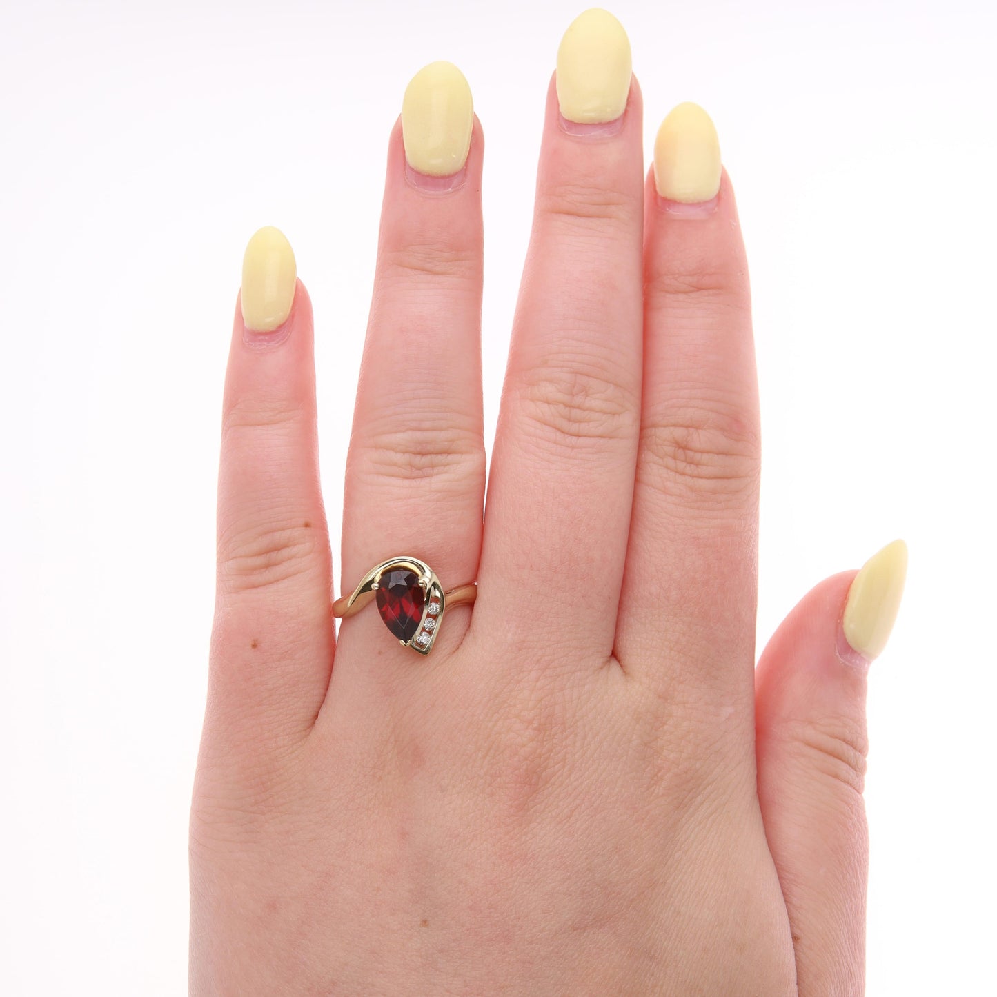 10k Yellow Gold Pear Mozambique Garnet & Diamond Curved Ring