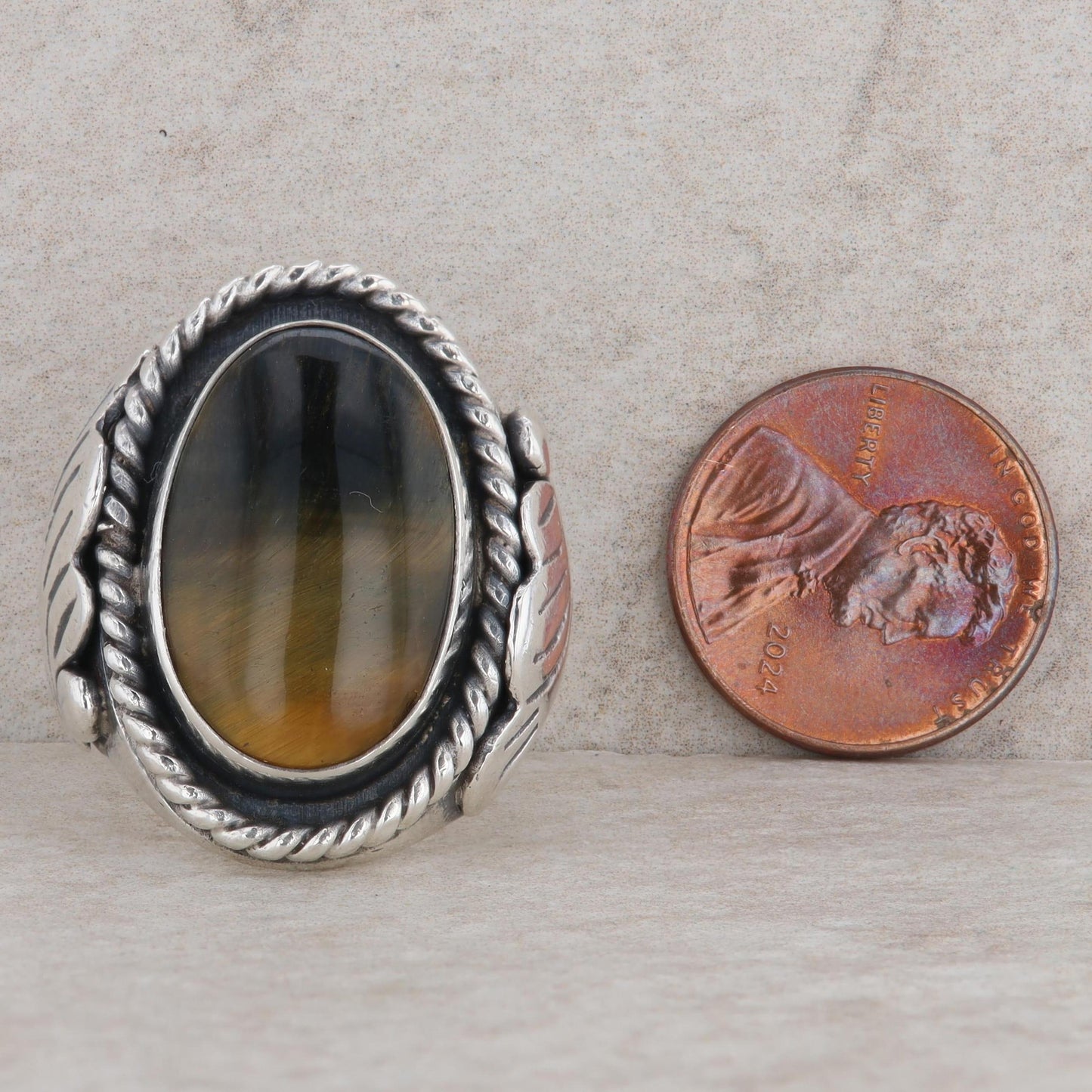 Sterling Silver Oval Cabochon Tigers Eye Winged Rope Frame Ring