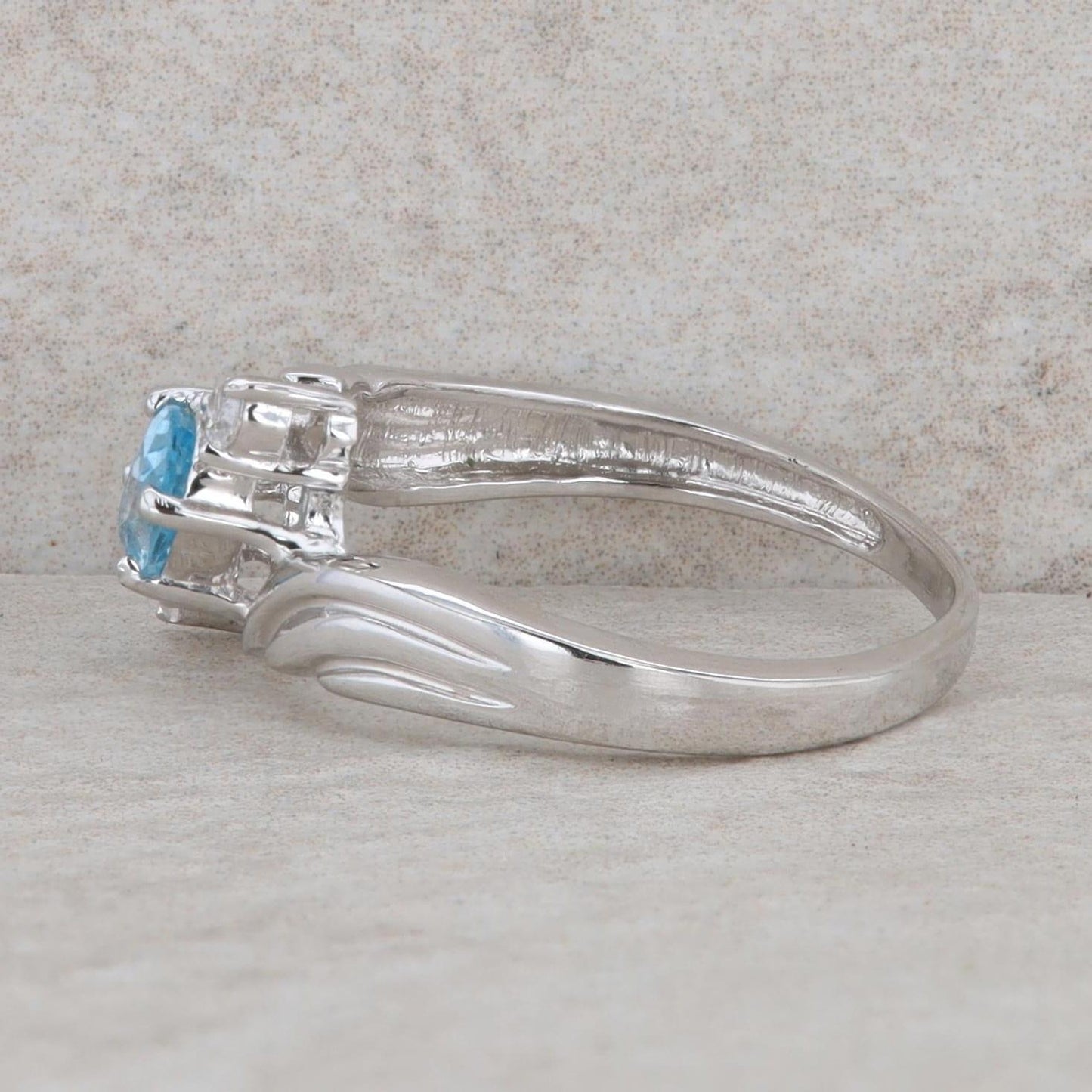 Sterling Silver Oval Blue Topaz & Round Cubic Zirconia Bypass Ring