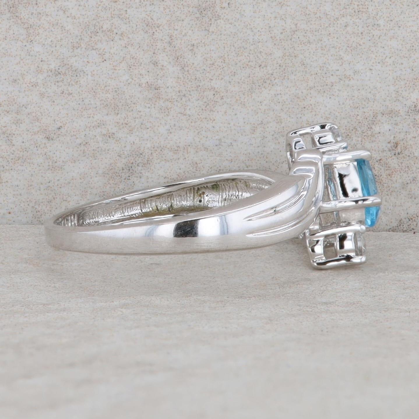 Sterling Silver Oval Blue Topaz & Round Cubic Zirconia Bypass Ring