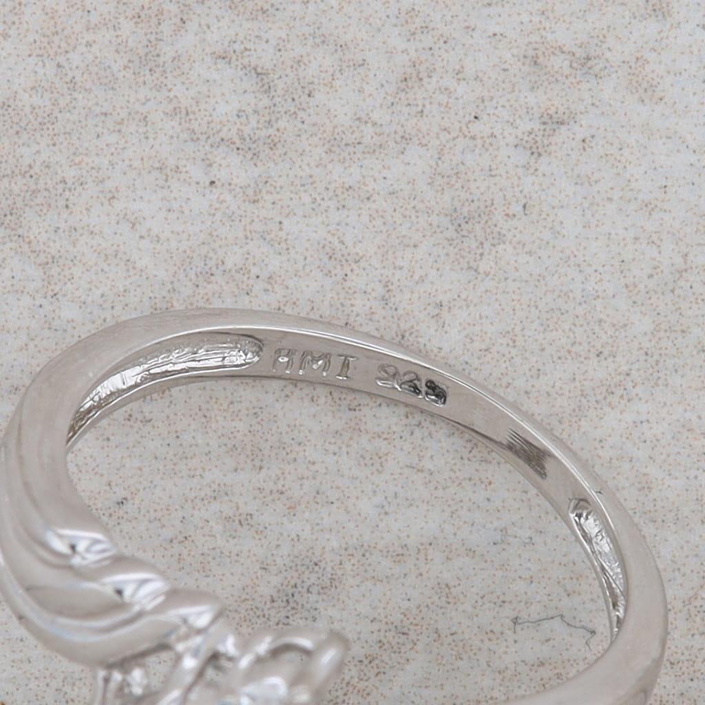 Sterling Silver Oval Blue Topaz & Round Cubic Zirconia Bypass Ring