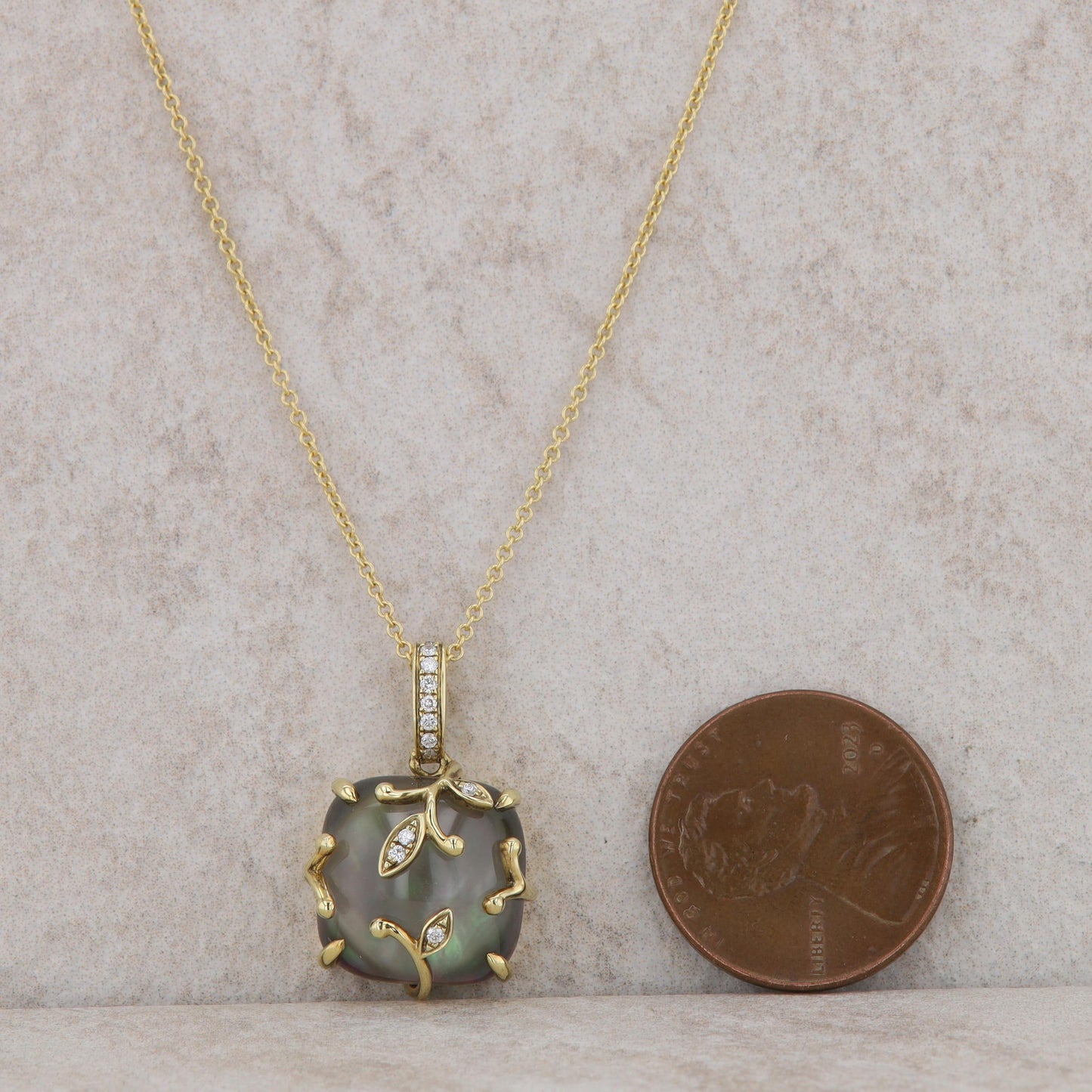 18k Yellow Gold White Topaz, Diamond, and Black Mother of Pearl Necklace