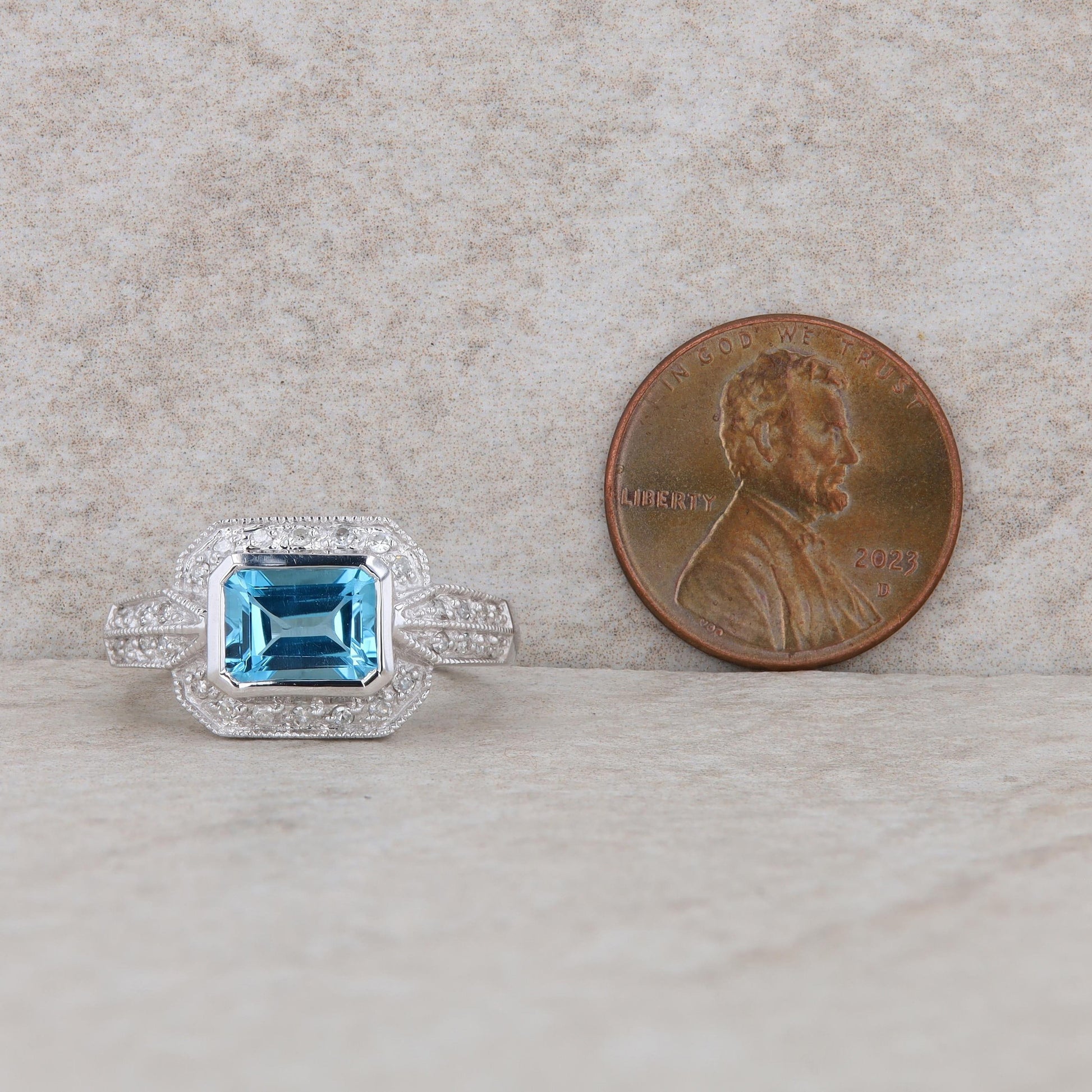 14k White Gold Blue Topaz and Diamond Halo Ring