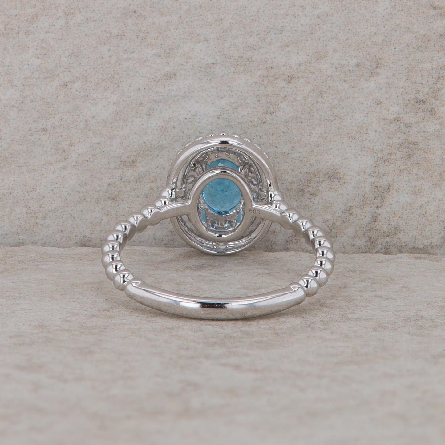 14k White Gold Diamond Halo Oval Blue Topaz Ring