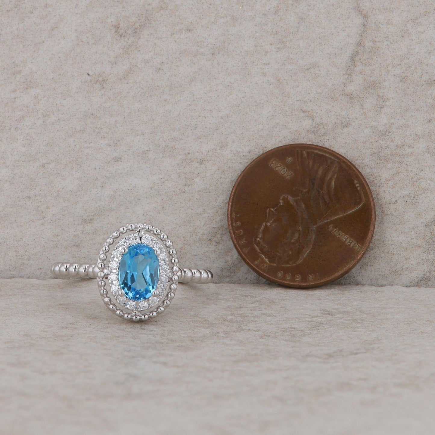 14k White Gold Diamond Halo Oval Blue Topaz Ring