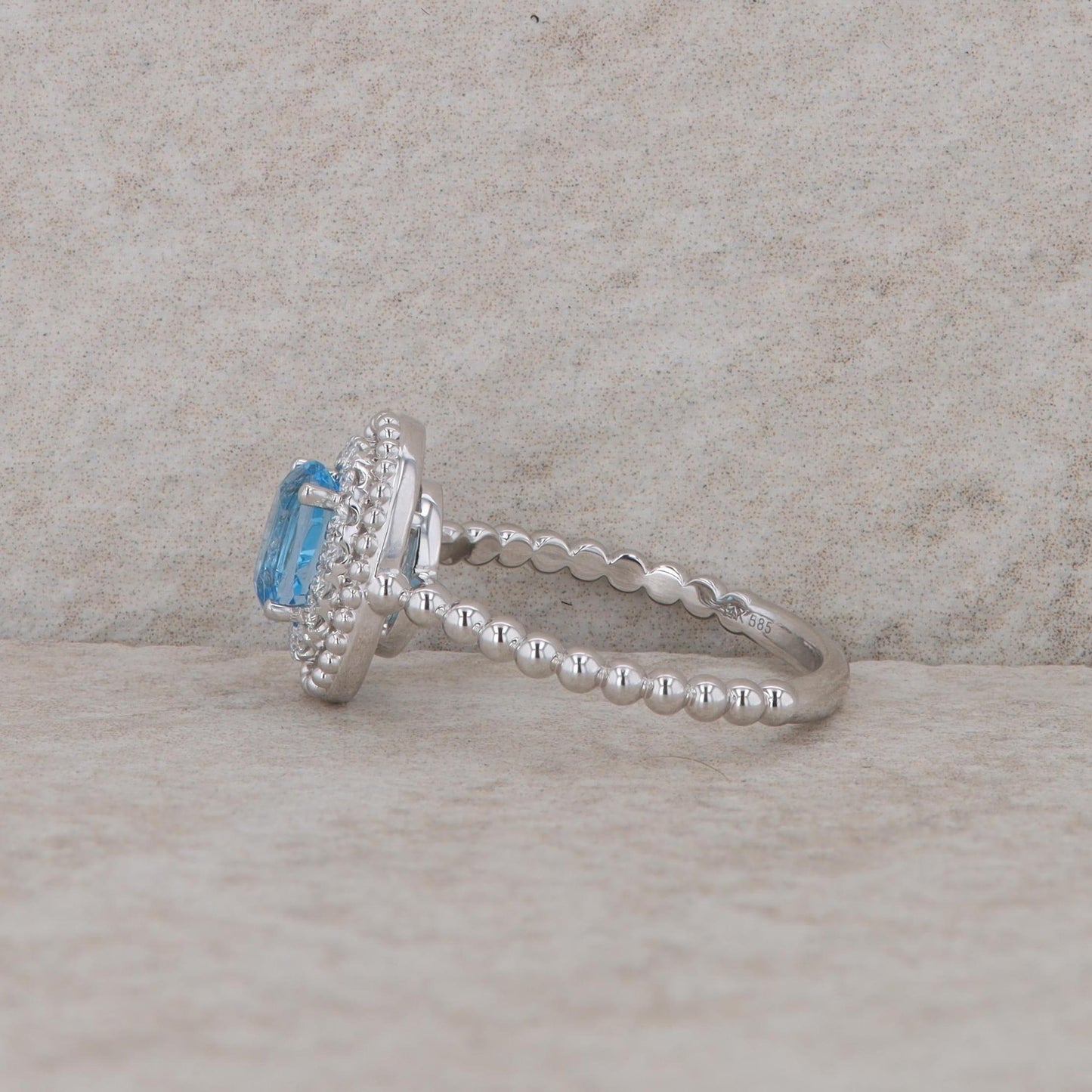 14k White Gold Diamond Halo Oval Blue Topaz Ring