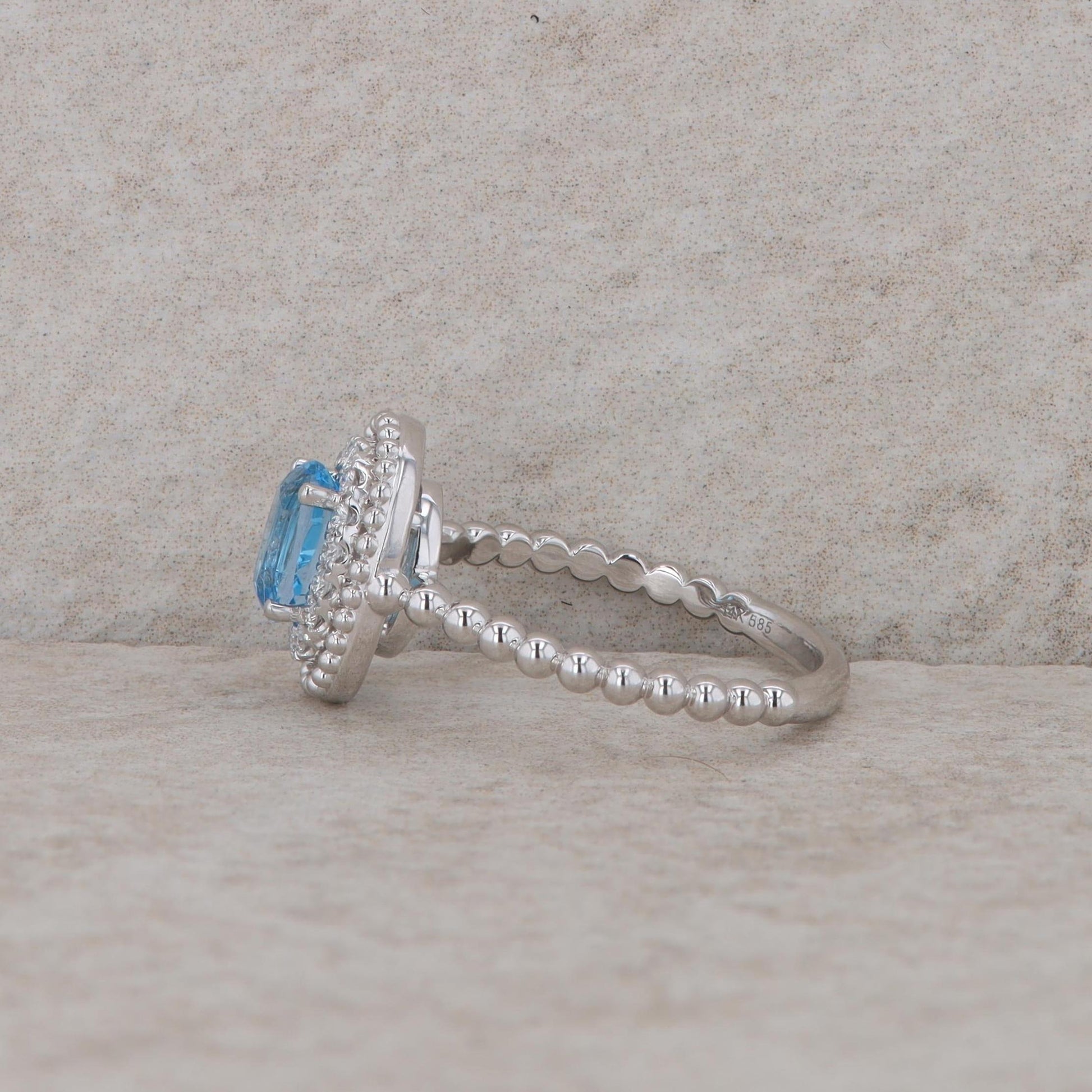 14k White Gold Diamond Halo Oval Blue Topaz Ring