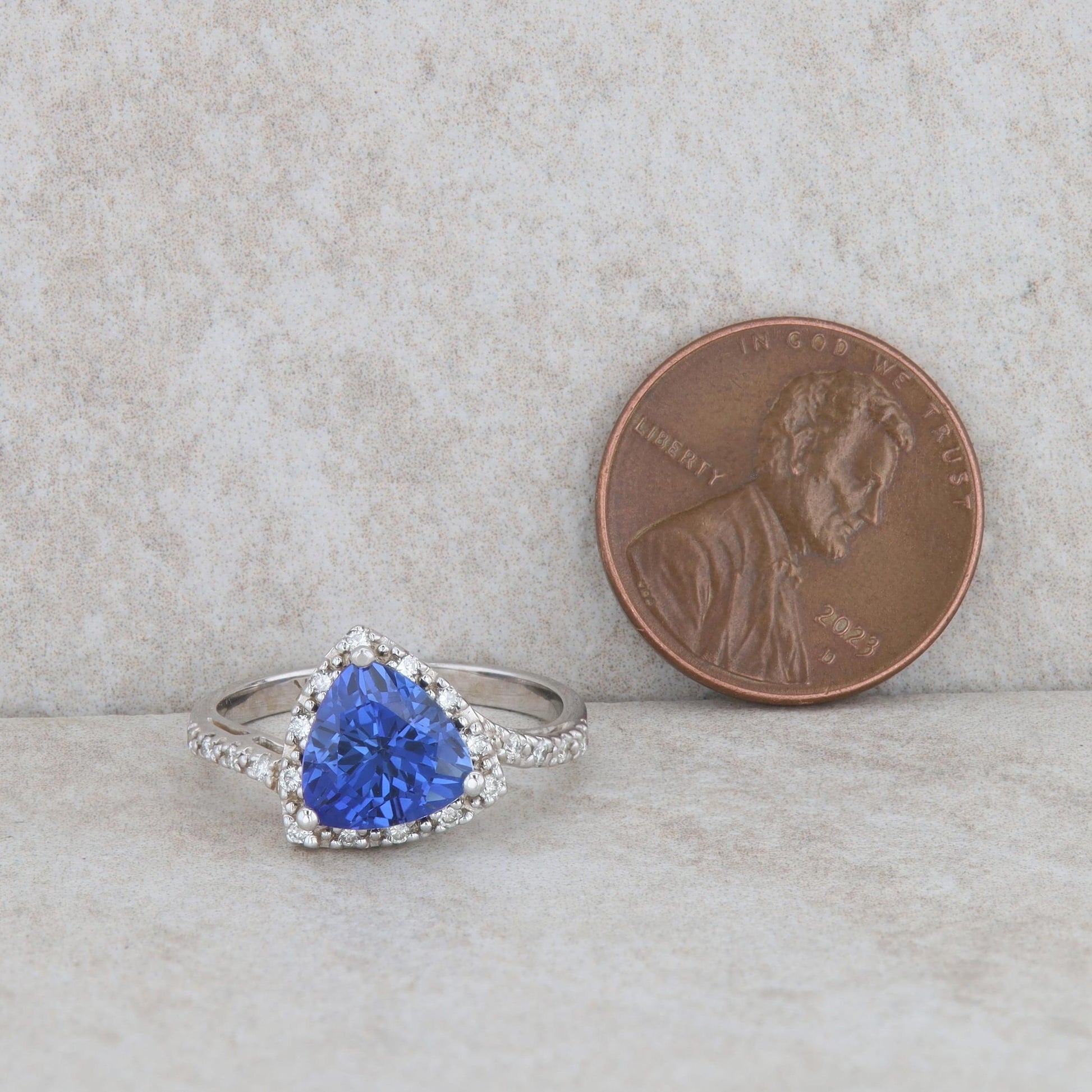 14k White Gold Synthetic Sapphire Trillion and Diamond Halo Ring