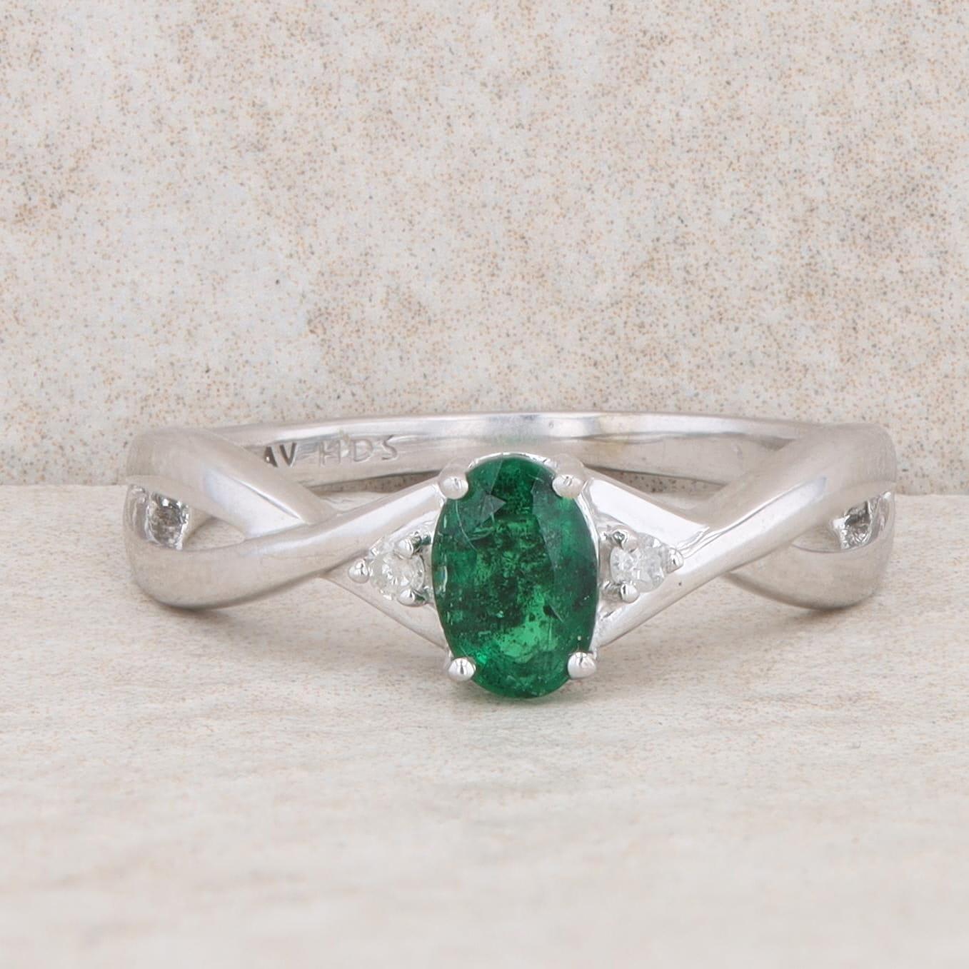 10k White Gold Diamond and Oval Emerald Twist Ring