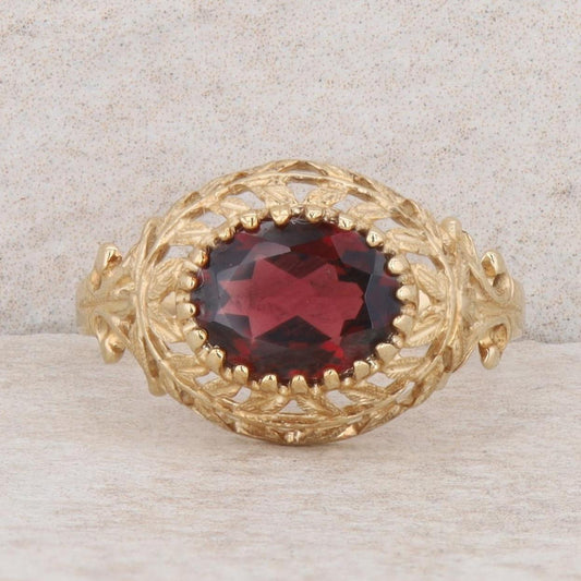 10k Yellow Gold Oval Garnet East/West Set Leaf Filigree Ring, Finger Size 7.25