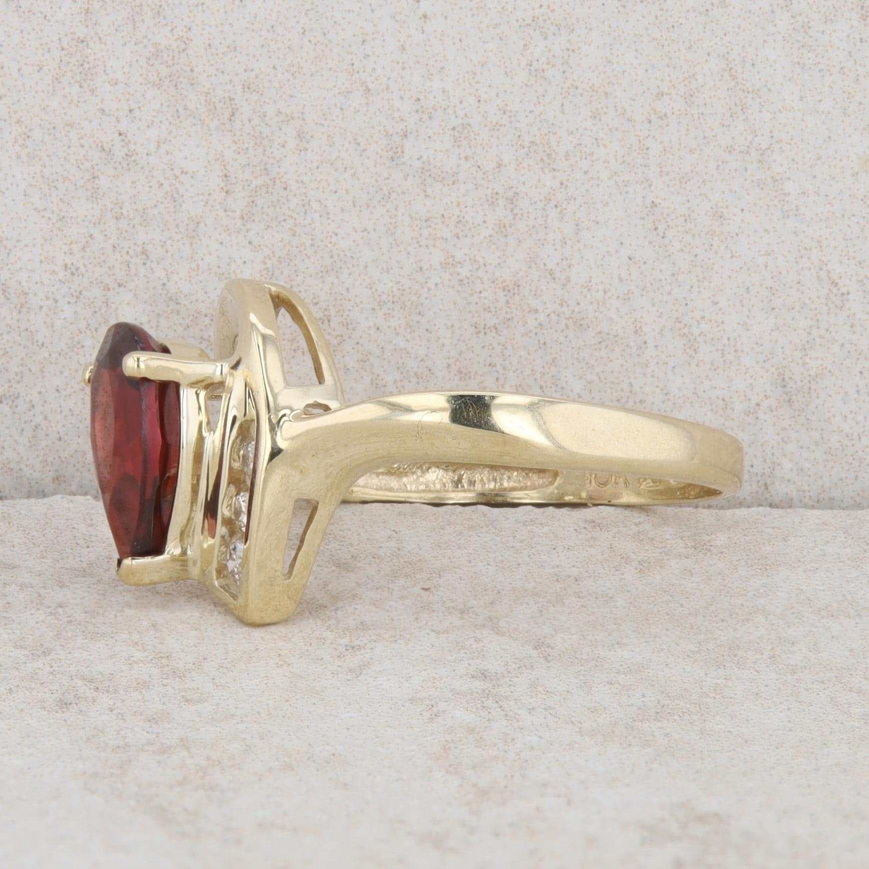 10k Yellow Gold Pear Mozambique Garnet & Diamond Curved Ring