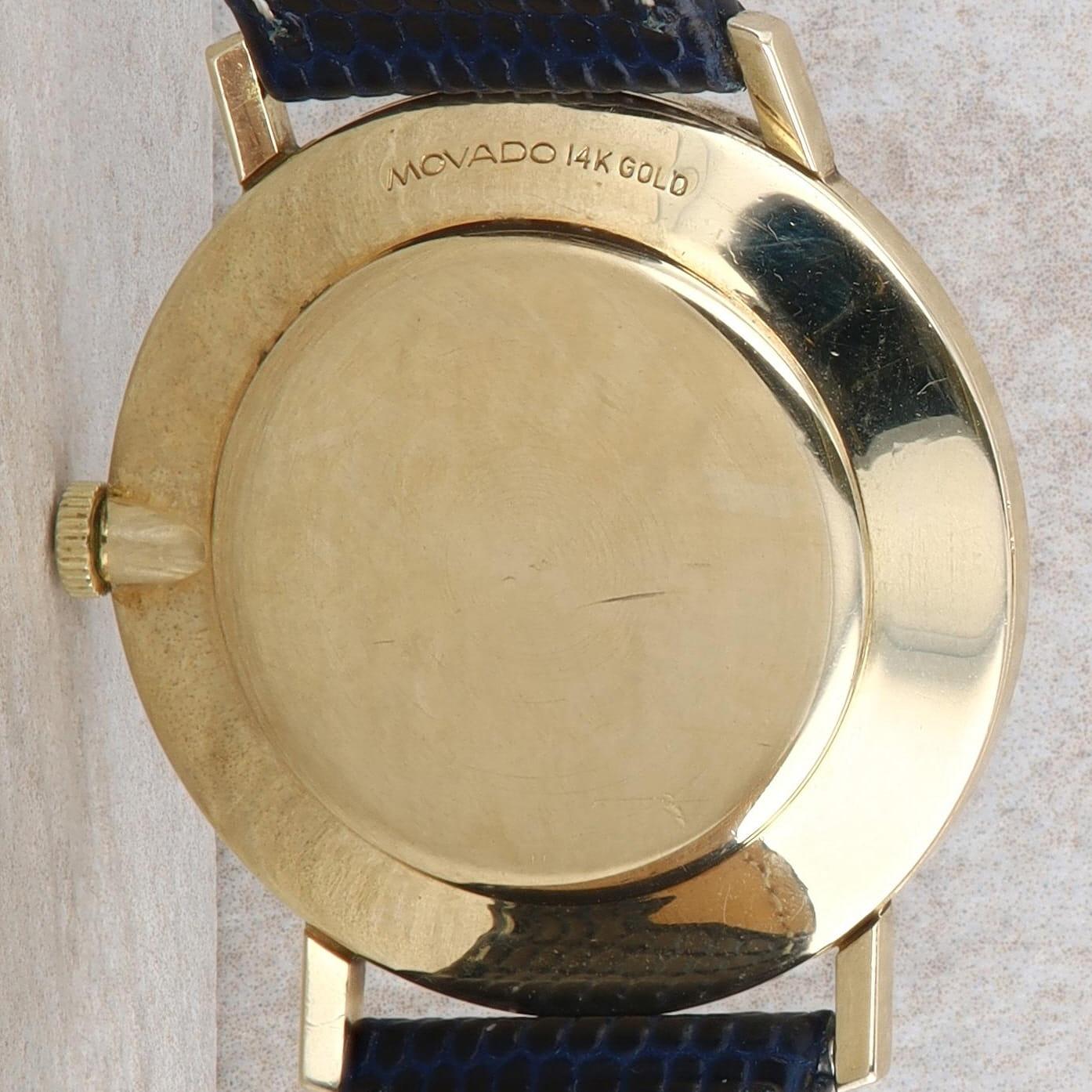 Movado Unisex 14k Yellow Navy Dial and Gold Accents Watch