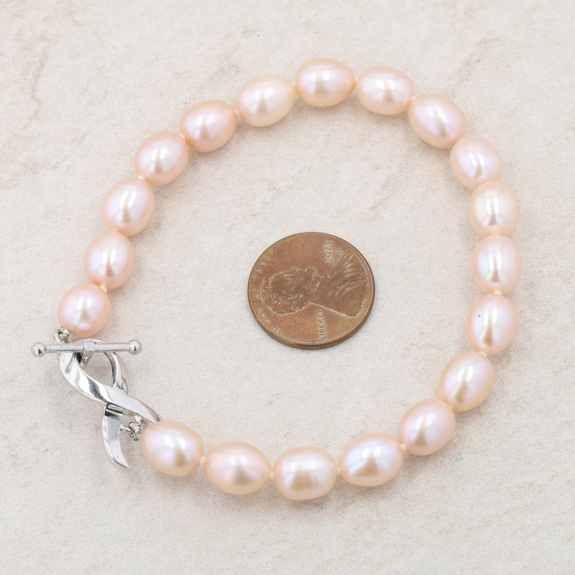 Sterling Silver Pink Cultured Oval Pearl Strand Cancer Ribbon Toggle Bracelet