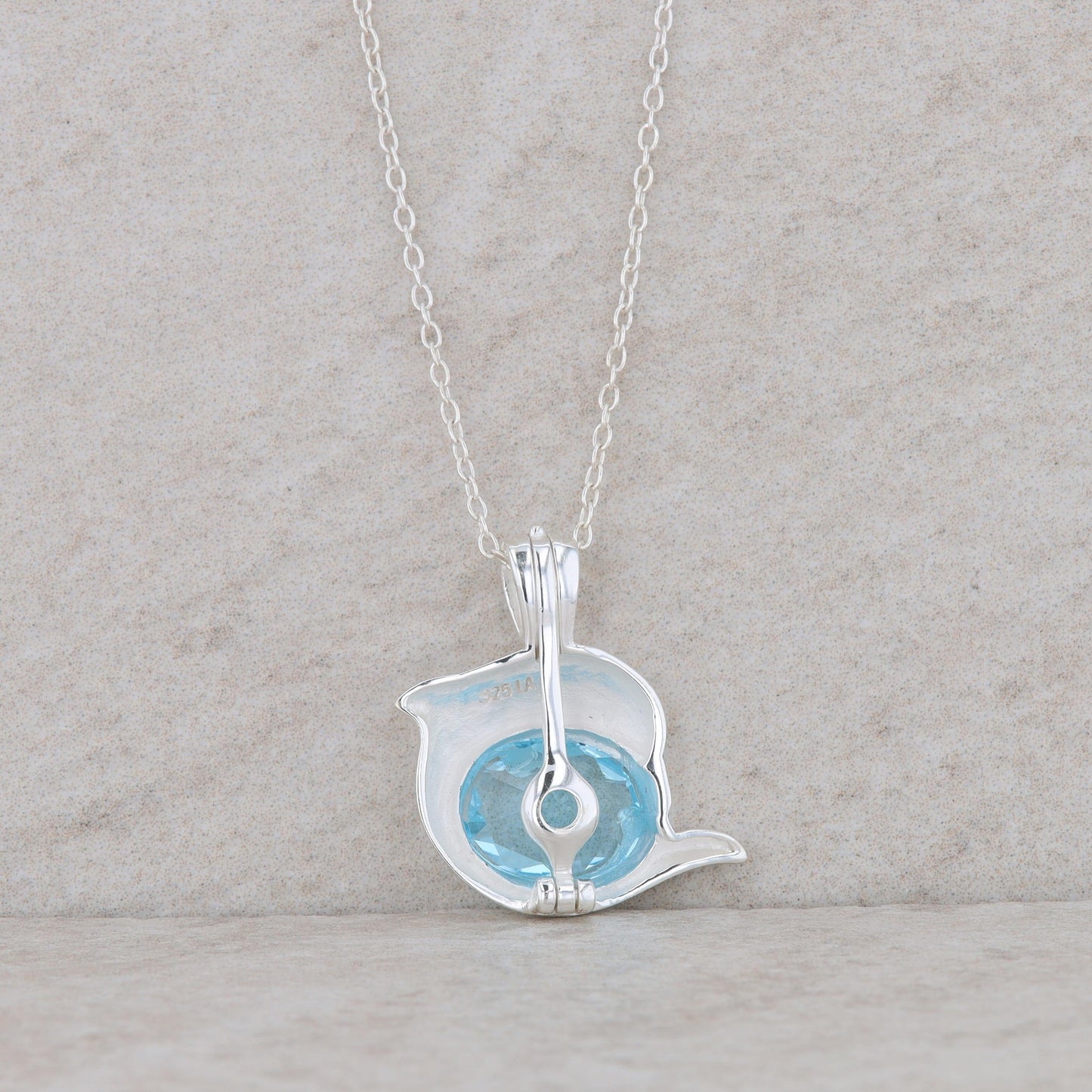 Sterling Silver Dolphin Blue Topaz Necklace