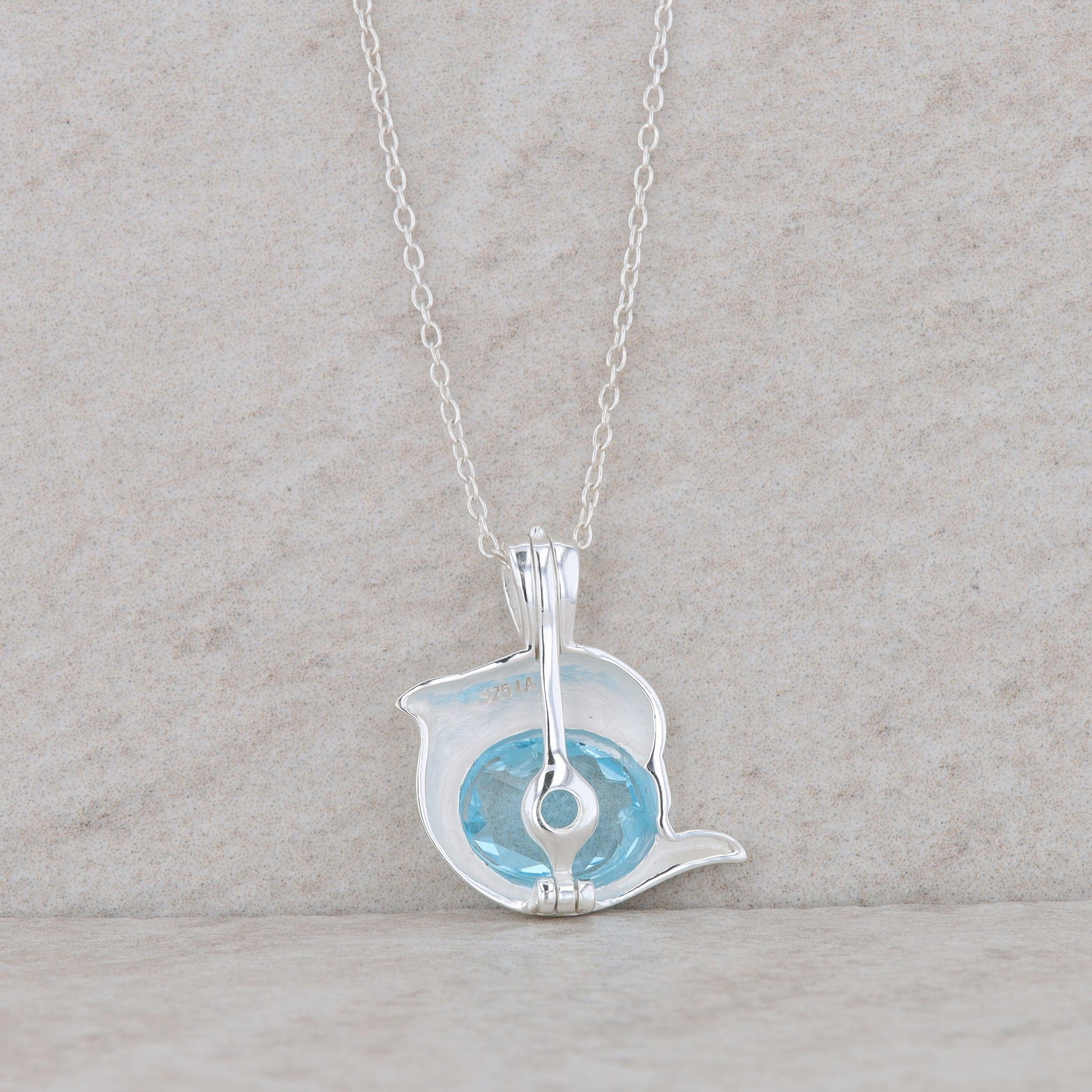 Sterling Silver Dolphin Blue Topaz Necklace