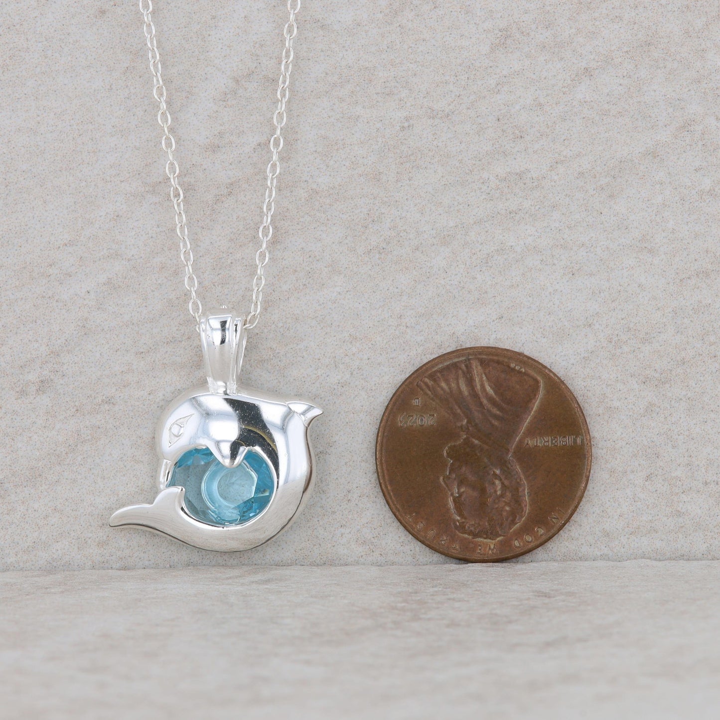 Sterling Silver Dolphin Blue Topaz Necklace