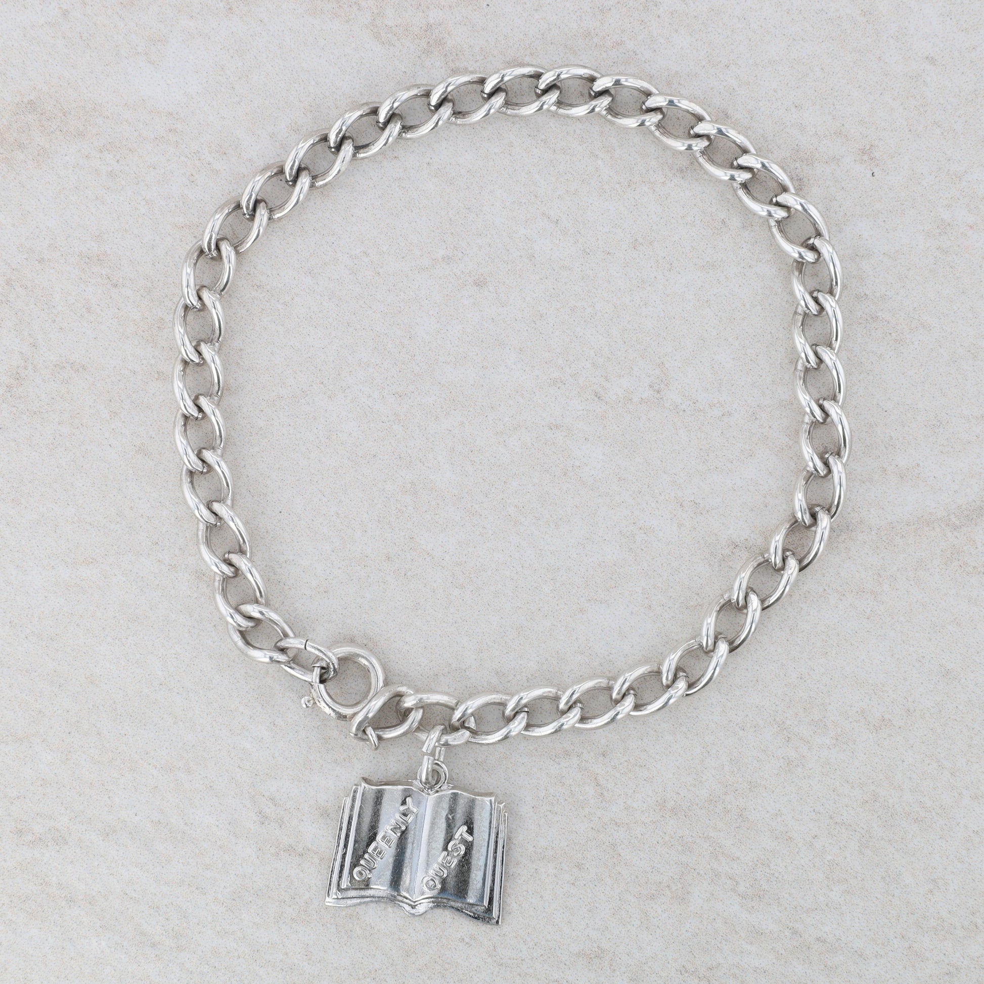 Sterling Silver Cable Bracelet with Queenly Quest Charm 10.4g