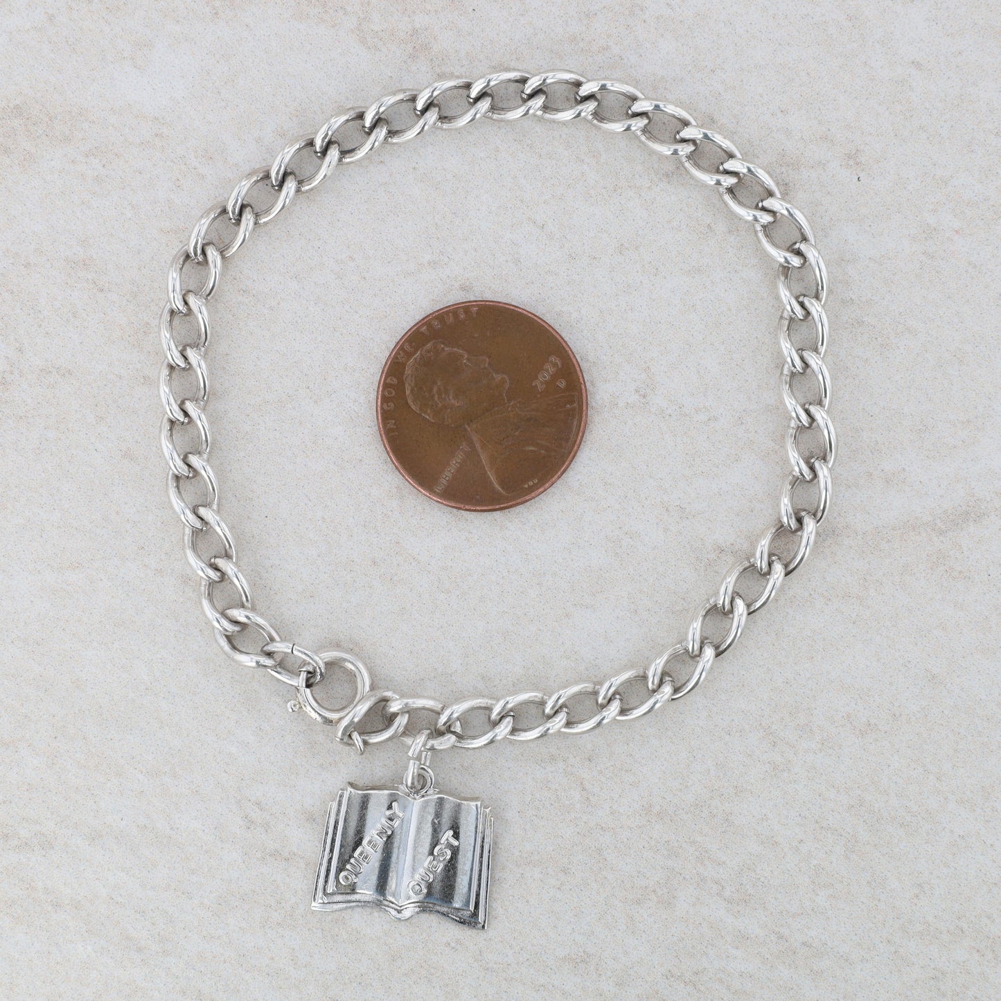 Sterling Silver Cable Bracelet with Queenly Quest Charm 10.4g