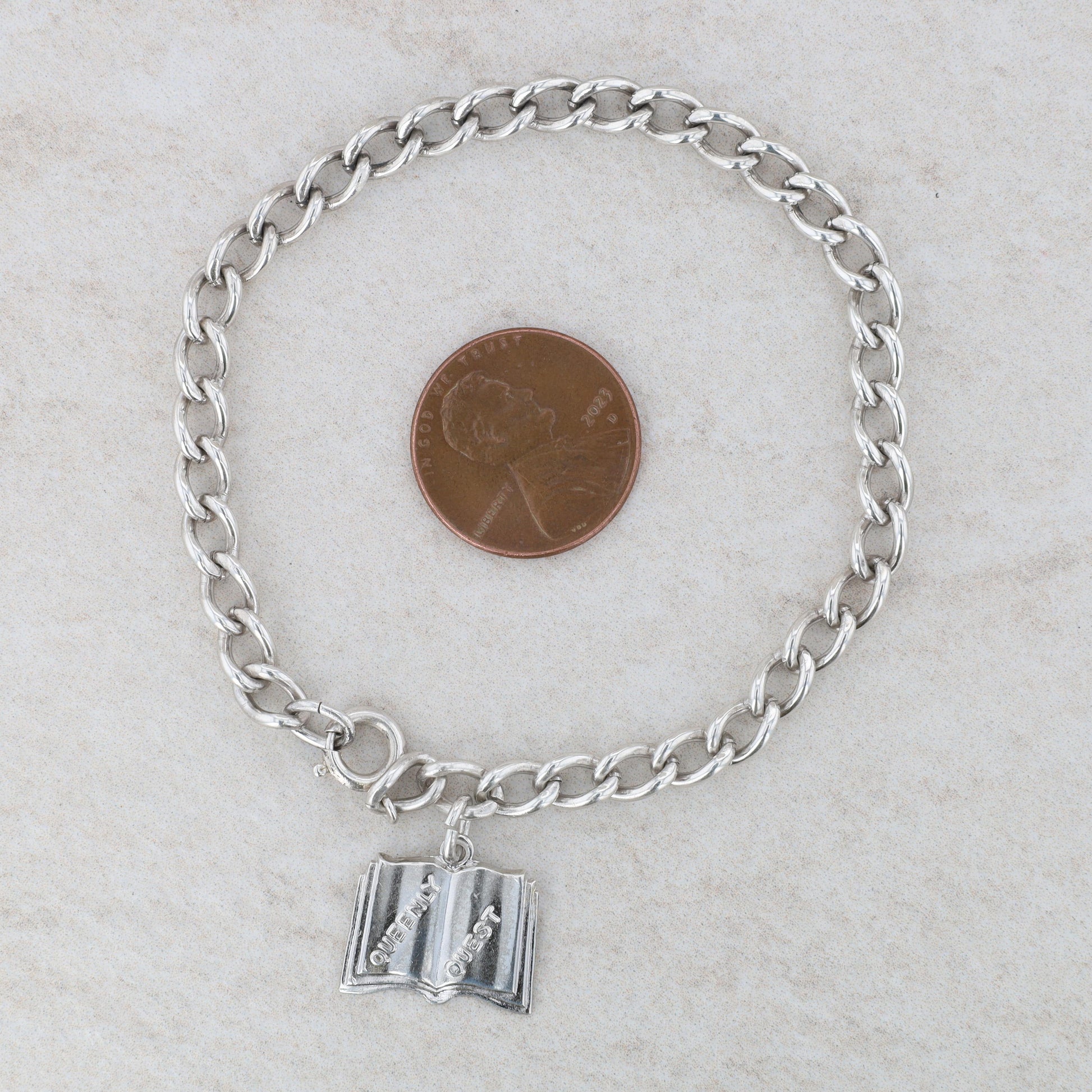 Sterling Silver Cable Bracelet with Queenly Quest Charm 10.4g