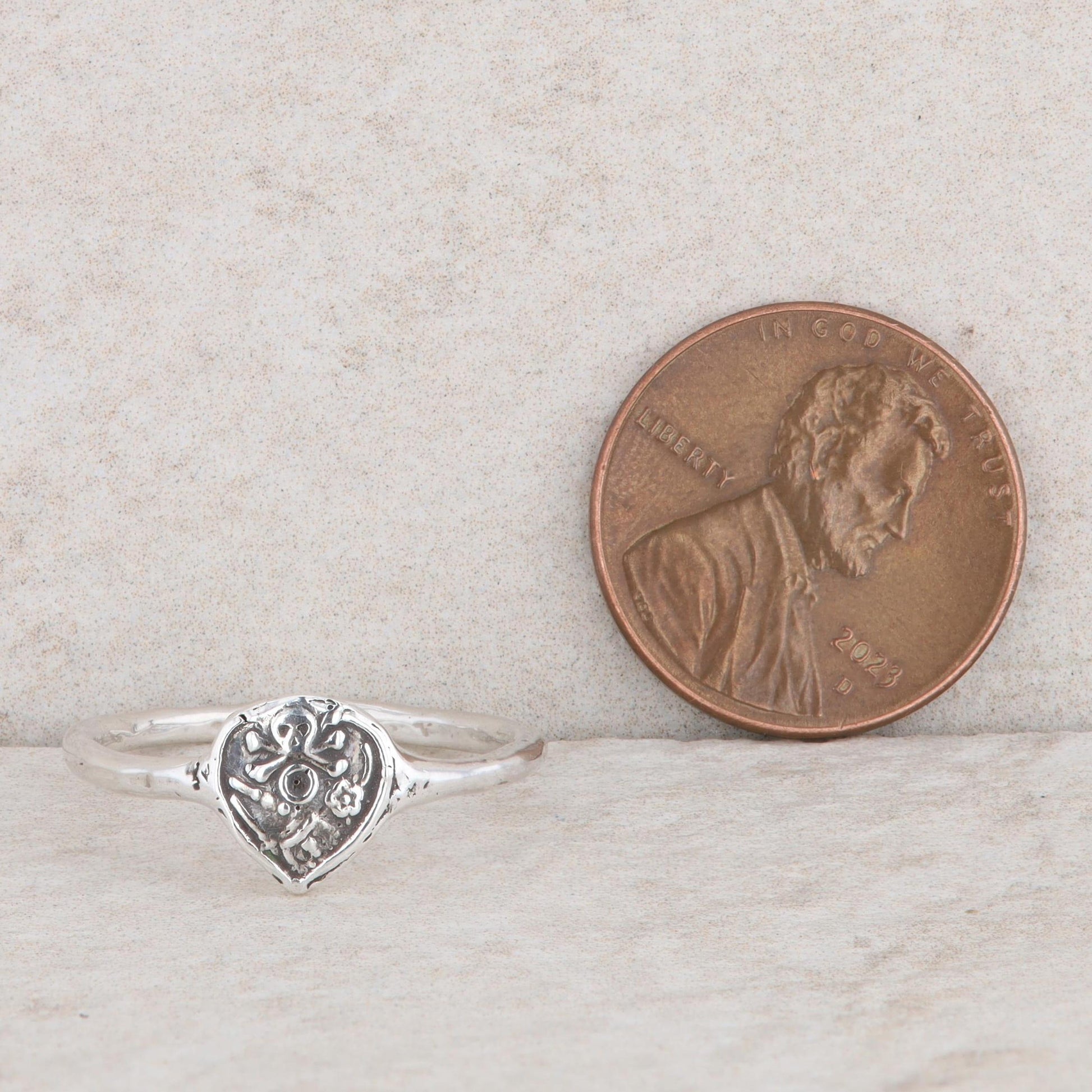 Sterling Silver Branded Pyrrha Mini Skull Ring