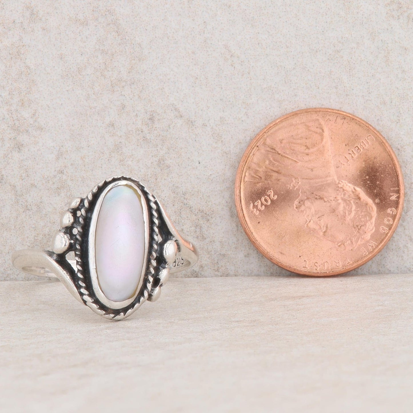 Sterling Silver Oval Mother Of Pearl Bypass Ring