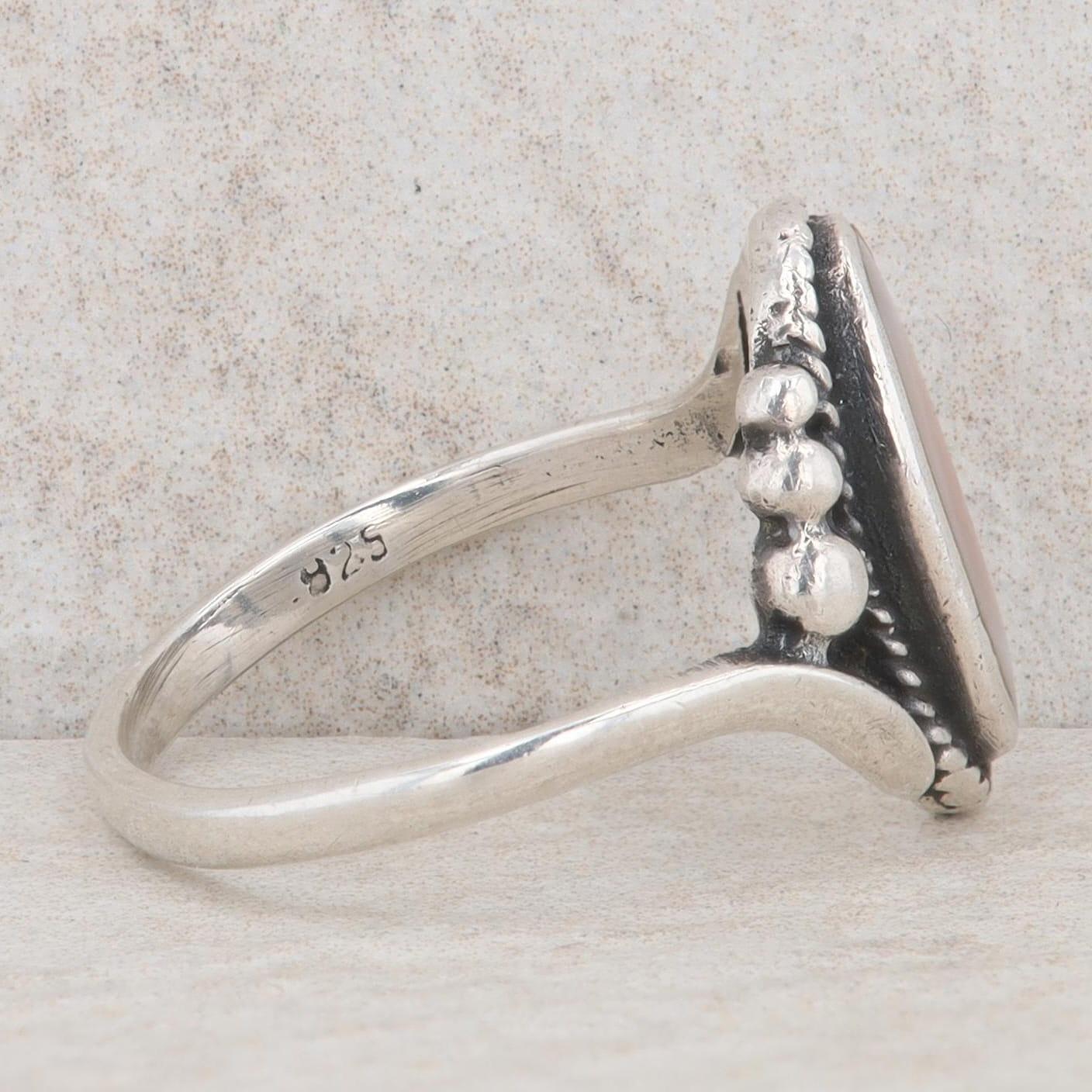 Sterling Silver Oval Mother Of Pearl Bypass Ring