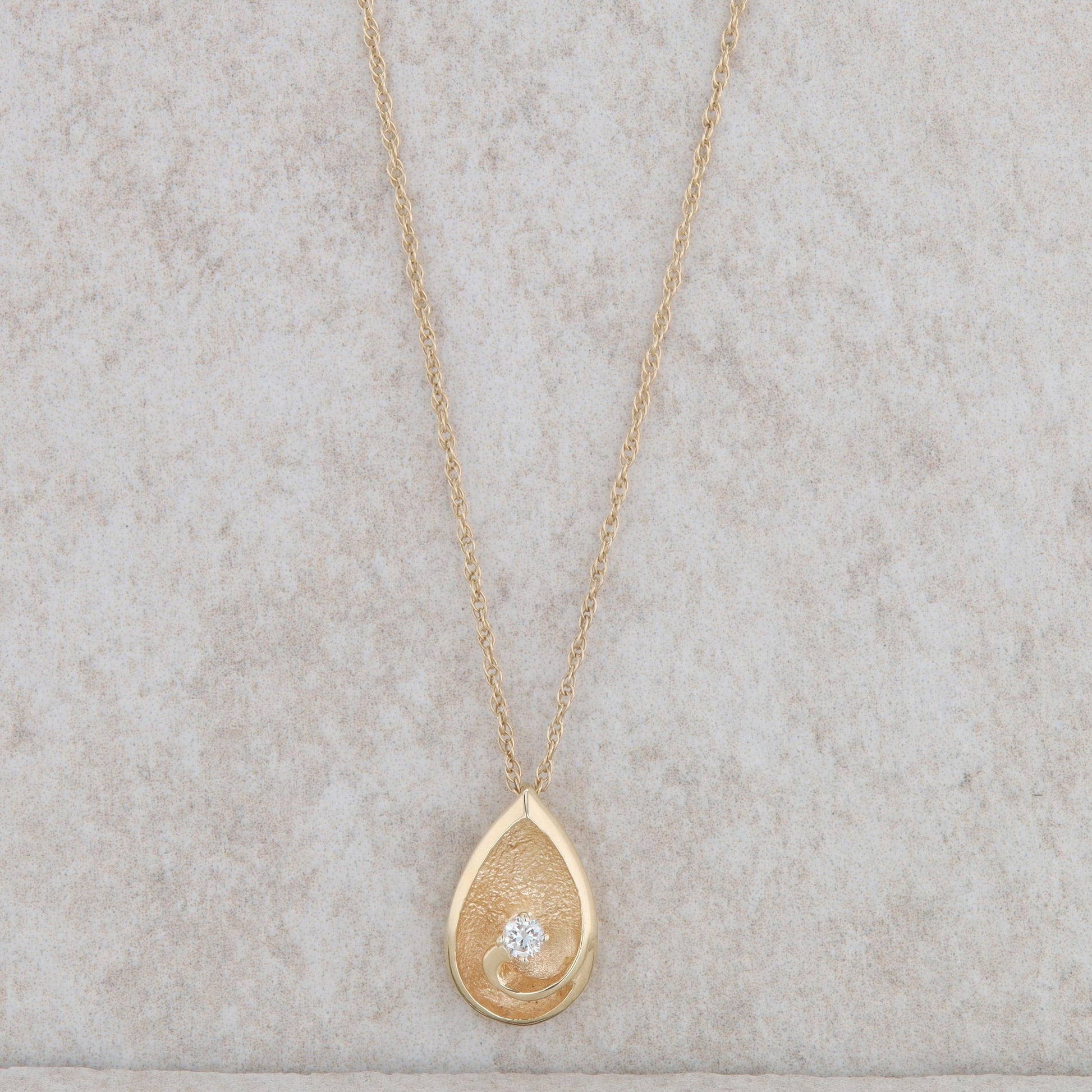 14k Yellow Gold Teardrop Swirl Diamond Necklace