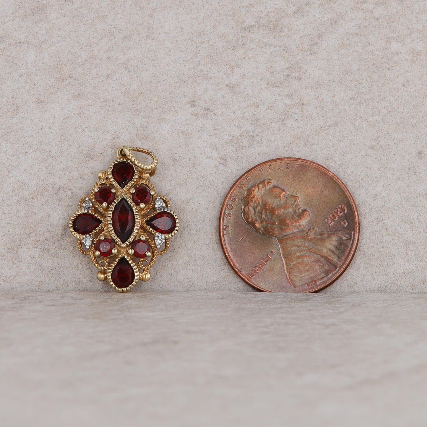 10k Yellow Gold Garnet and Diamond Milgrain Pendant