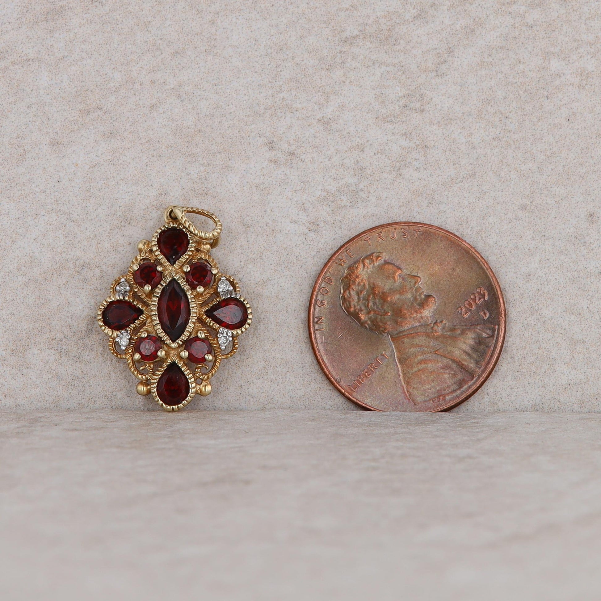 10k Yellow Gold Garnet and Diamond Milgrain Pendant