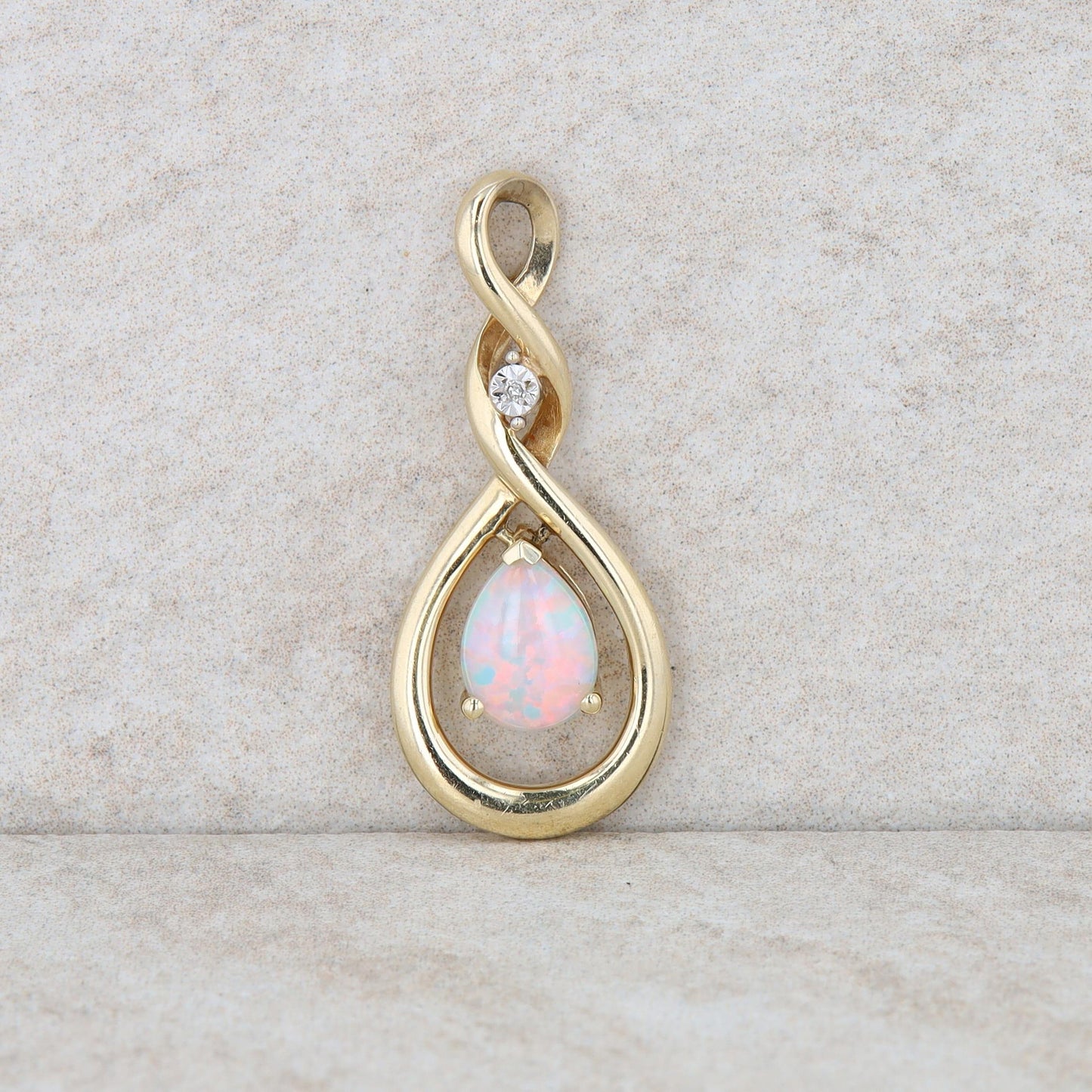 10k Yellow Gold Diamond and Pear Opal Twist Pendant