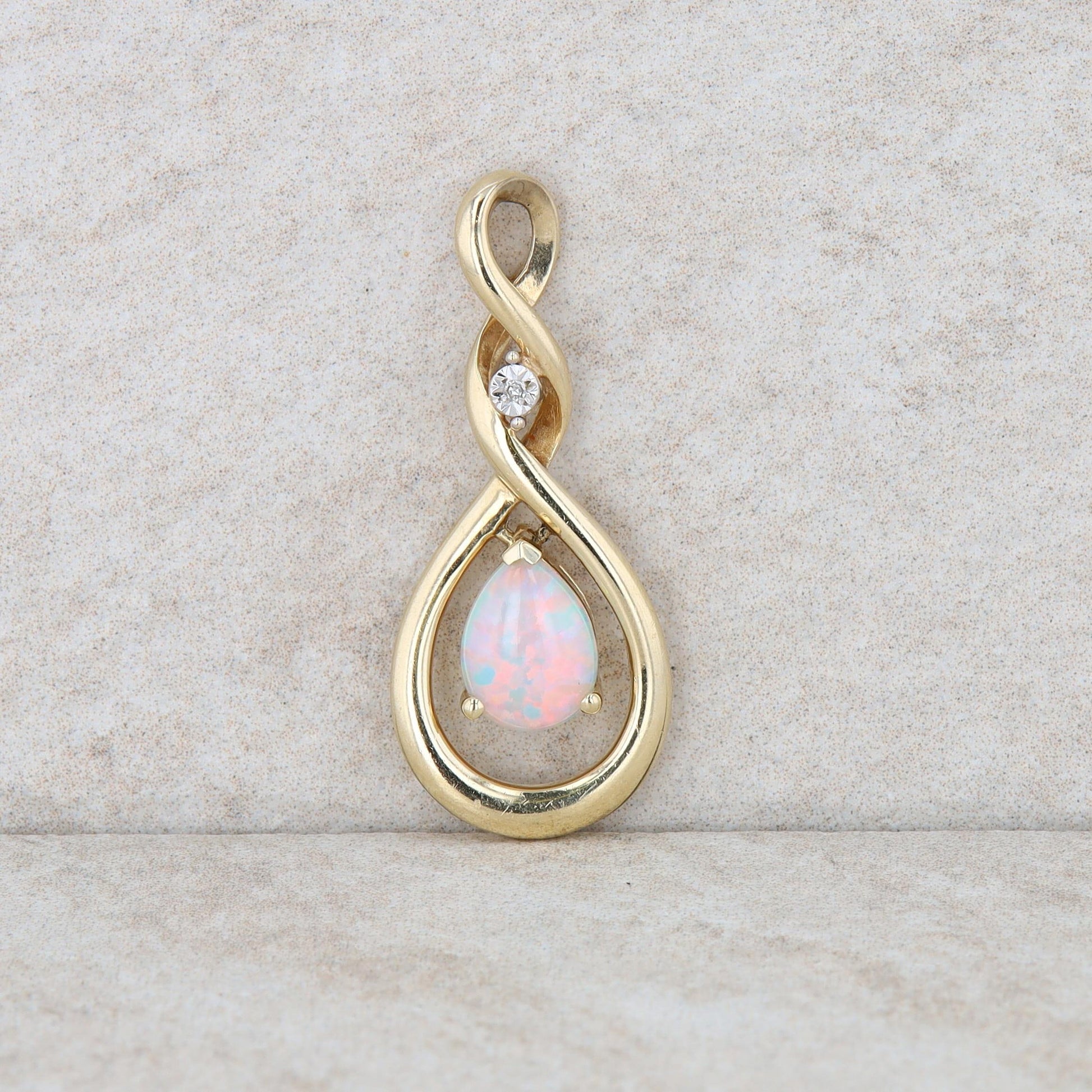 10k Yellow Gold Diamond and Pear Opal Twist Pendant