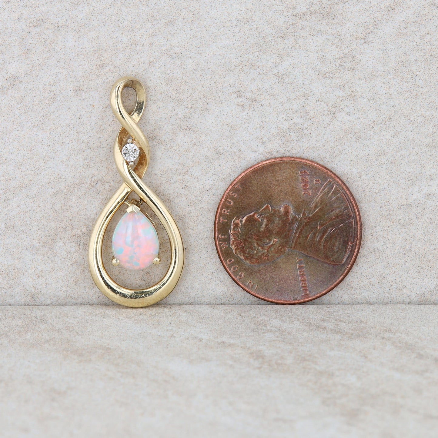 10k Yellow Gold Diamond and Pear Opal Twist Pendant