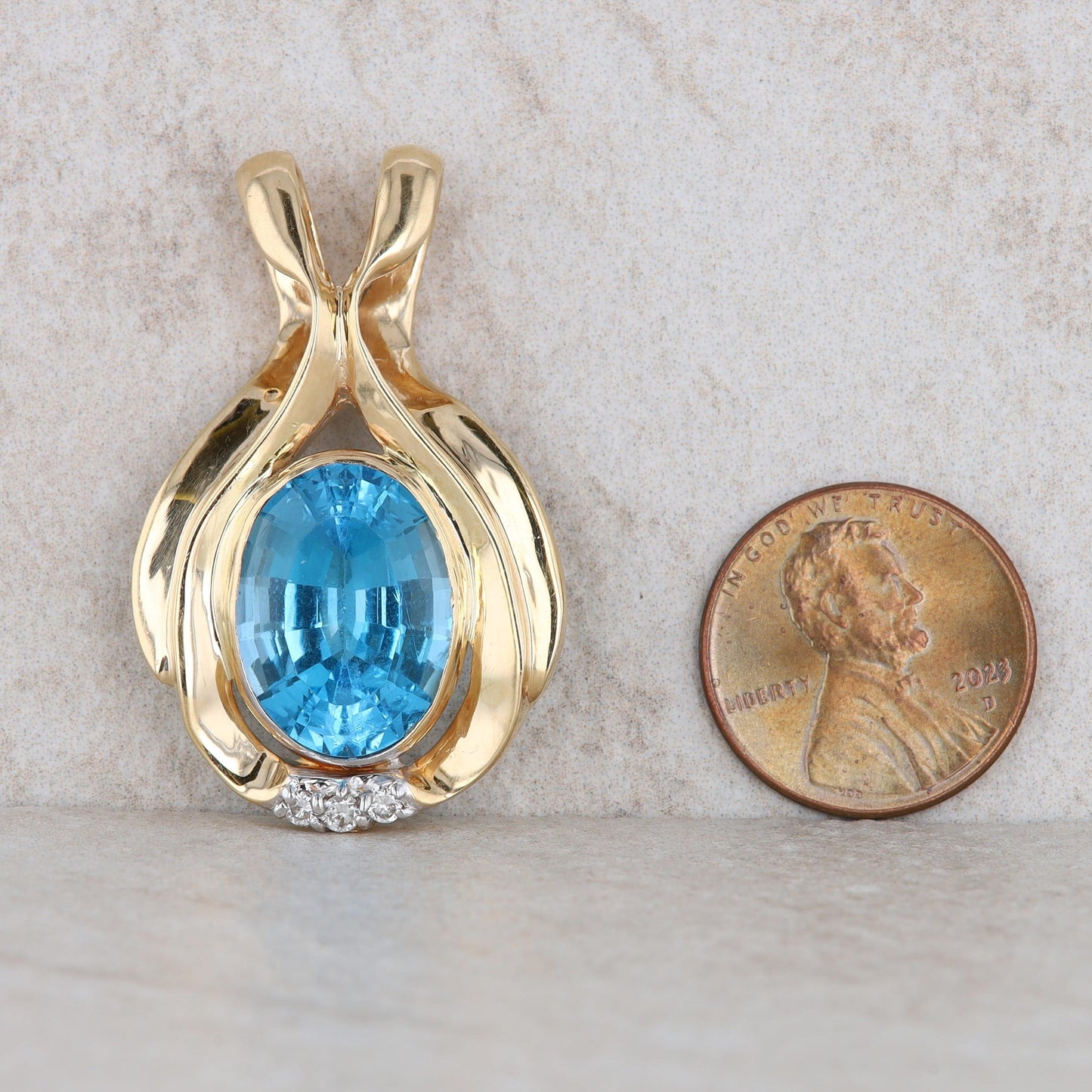 14k Yellow Gold Blue Topaz and Diamond Oval Pendant