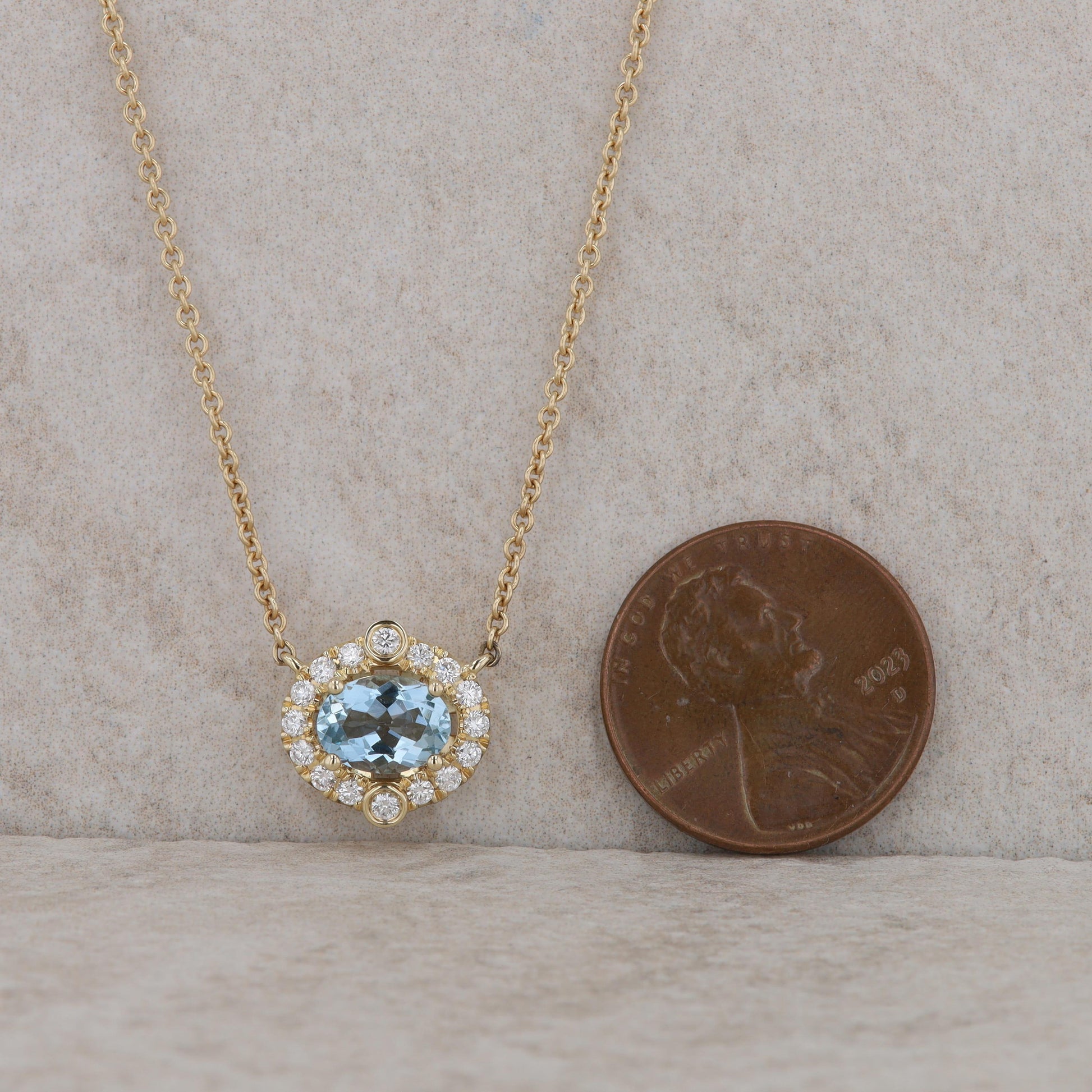 14k Yellow Gold Aquamarine and Diamond Halo Necklace