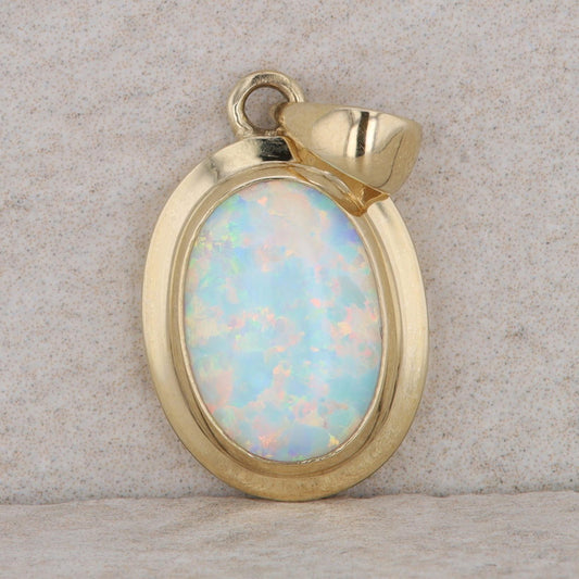 14k Yellow Gold Synthetic Oval Opal Pendant