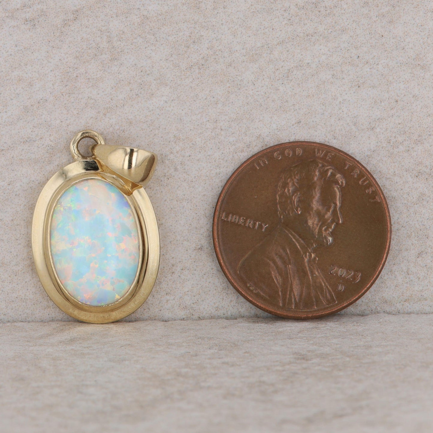 14k Yellow Gold Synthetic Oval Opal Pendant