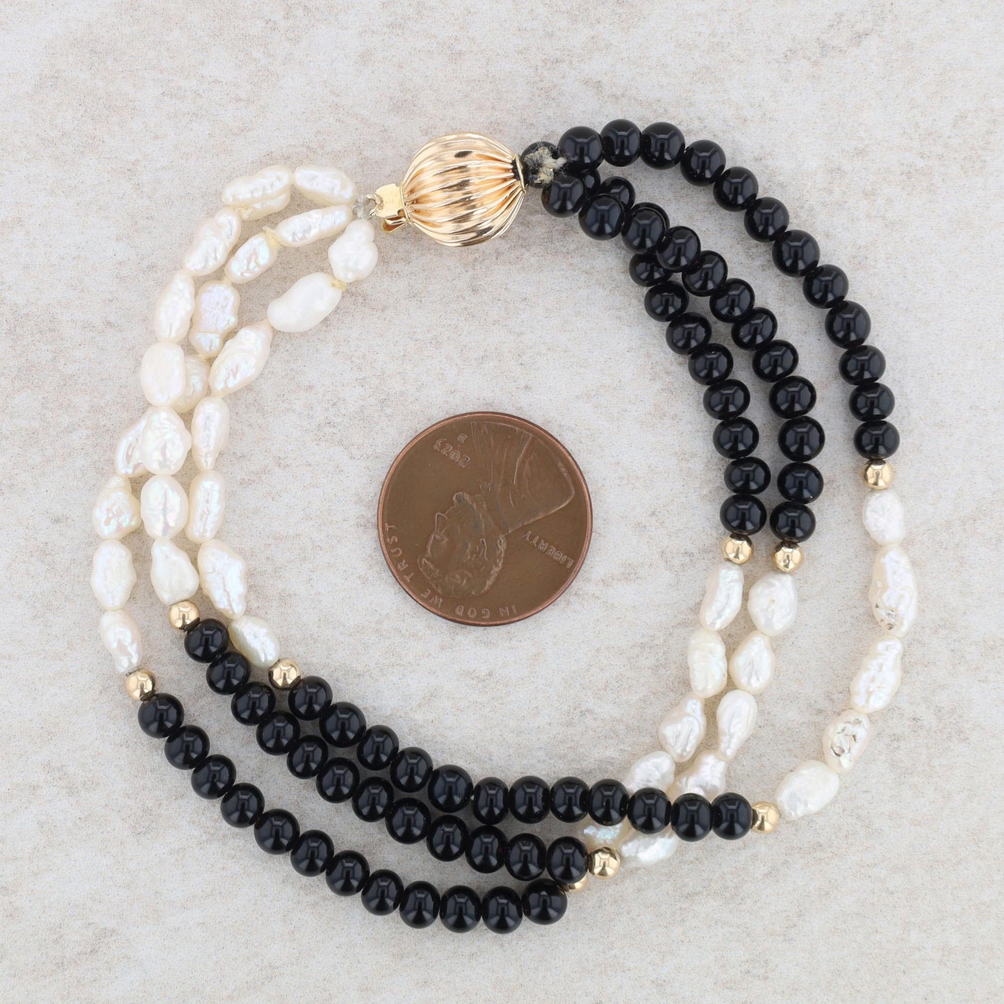 14k Yellow Gold Triple Strand Onyx and Freshwater Rice Pearl Bracelet