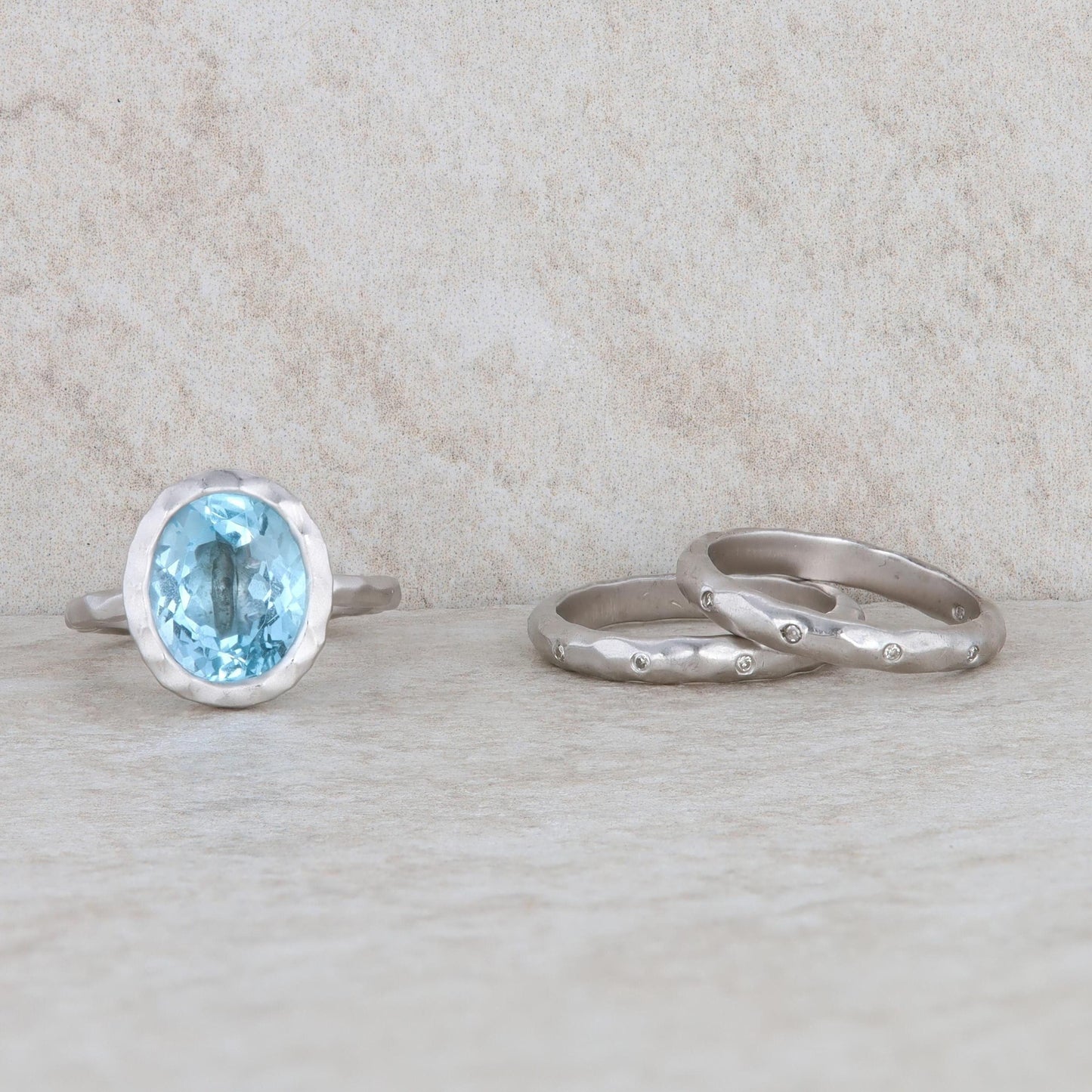 Sterling Silver Blue Topaz Ring with 2 Diamond Bands