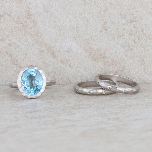 Sterling Silver Blue Topaz Ring with 2 Diamond Bands
