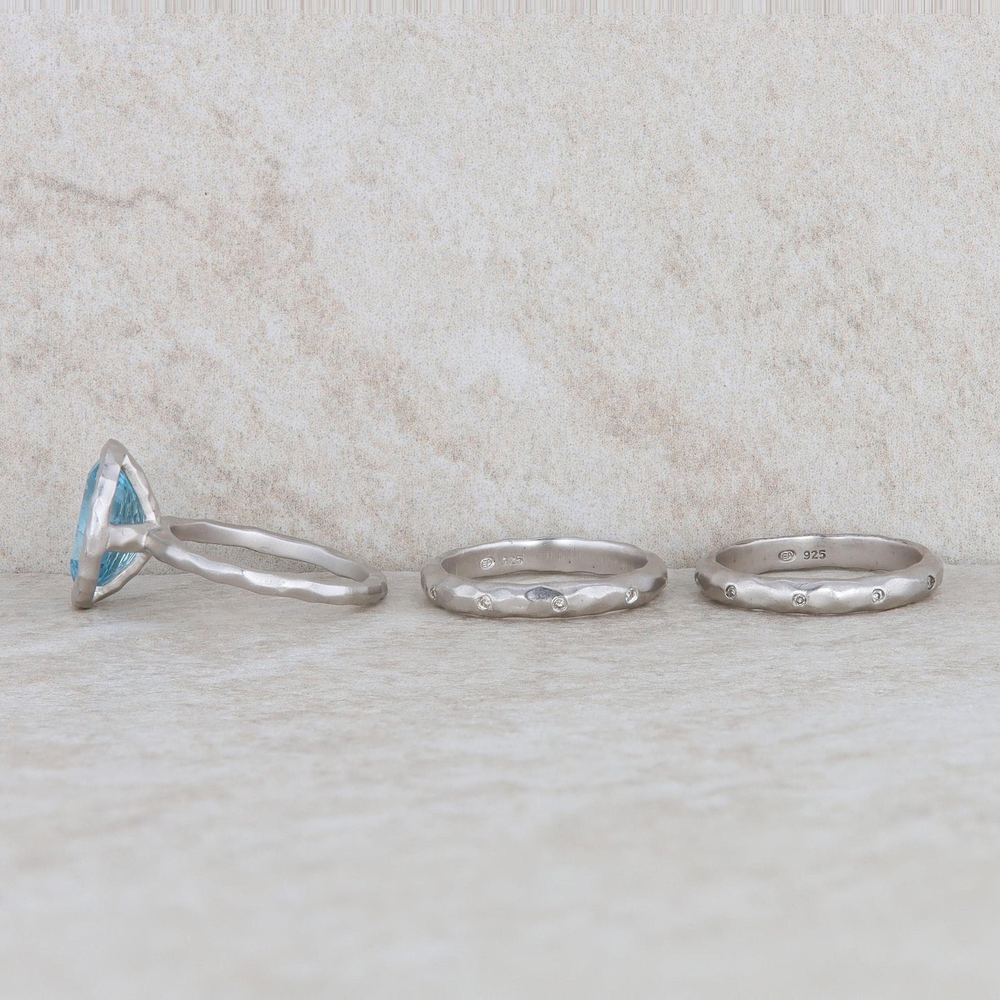 Sterling Silver Blue Topaz Ring with 2 Diamond Bands