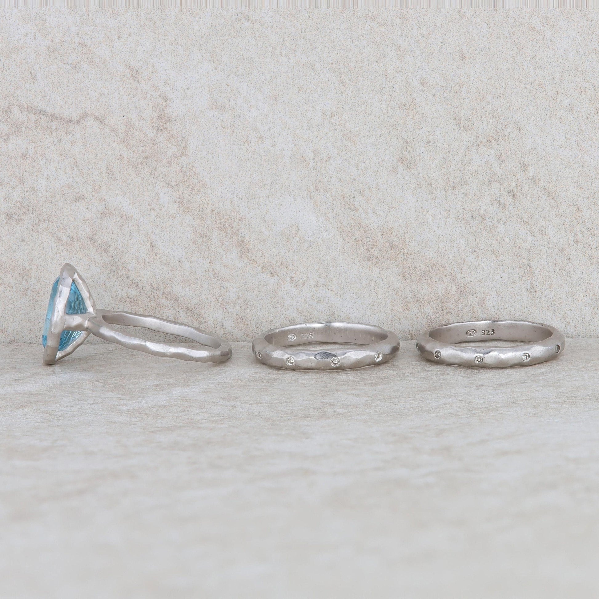 Sterling Silver Blue Topaz Ring with 2 Diamond Bands